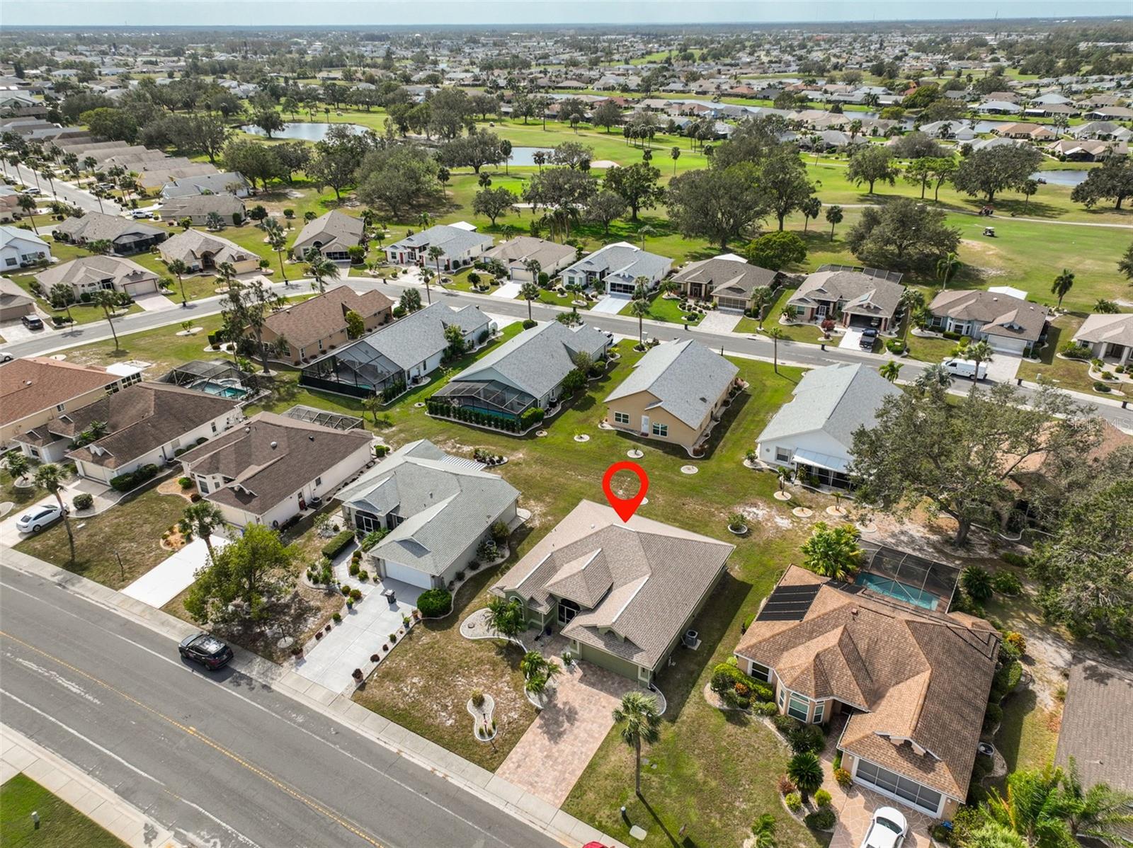 Aerial view of home & neighborhood