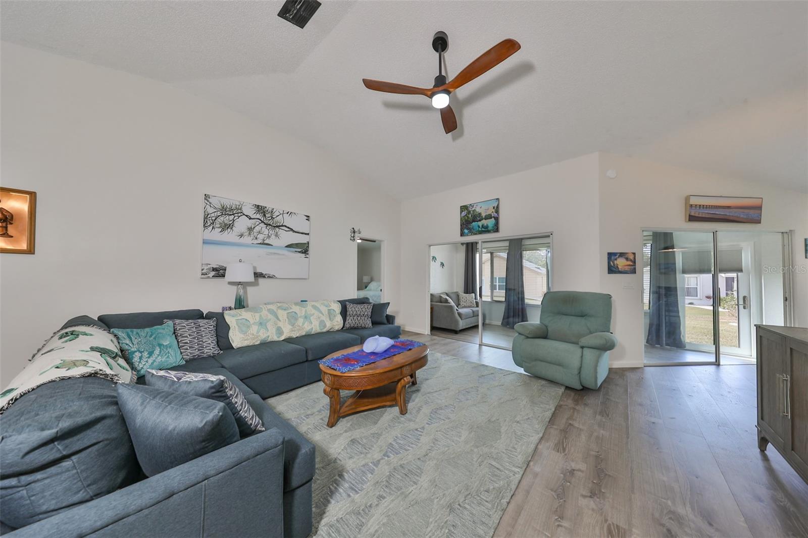 Living Room & Enclosed A/c Florida Room beyond