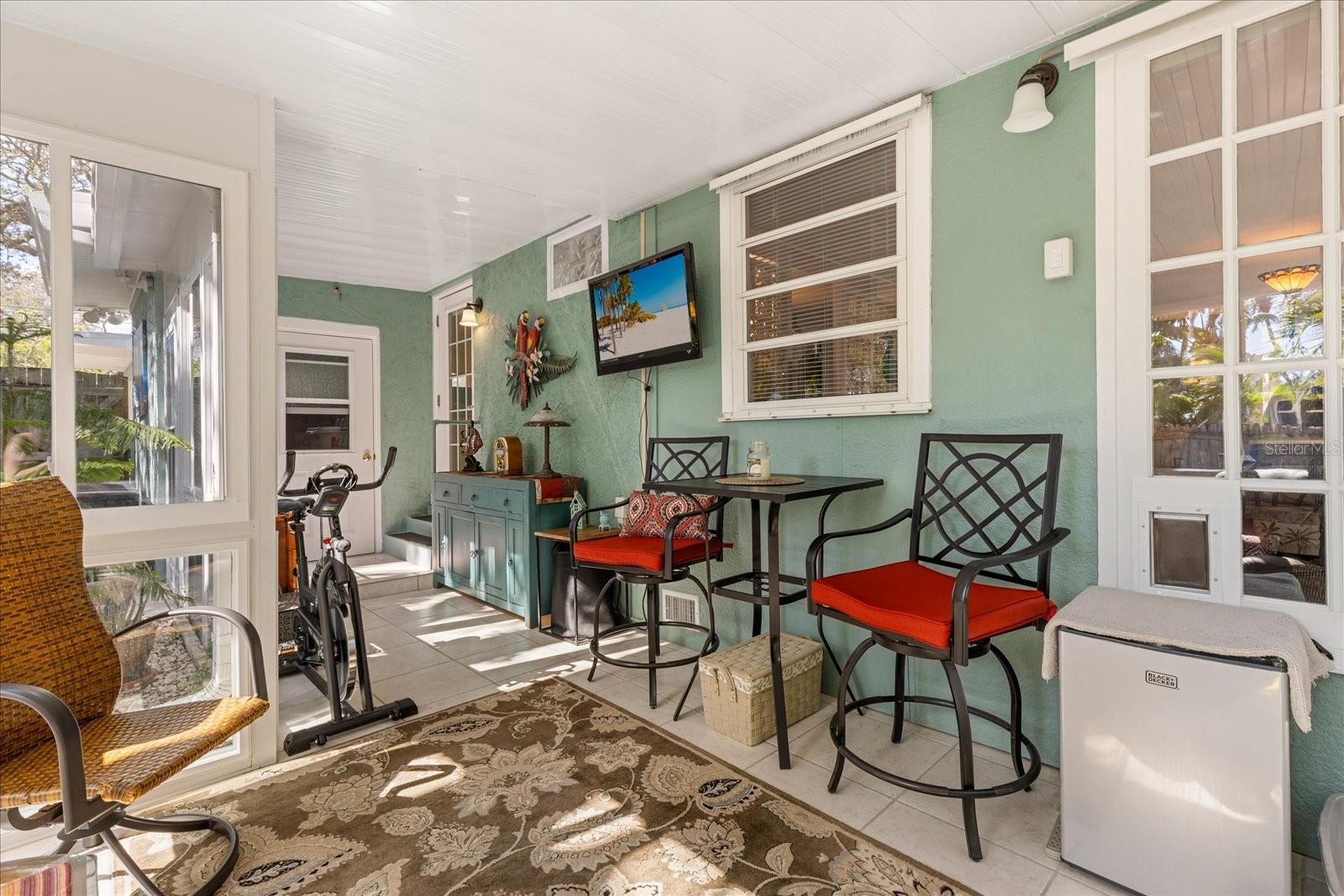 Just off the kitchen /dining room. Laundry/utility room through the other door