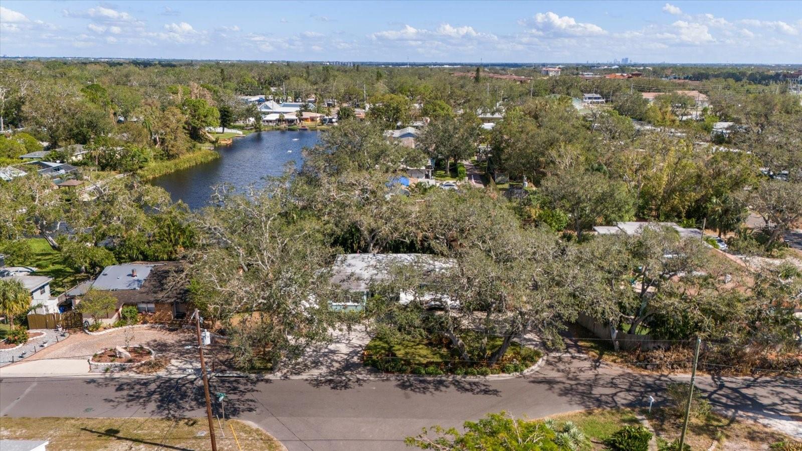 Lazy lake has a spillway to the east and did not rise substantially during Helene or Milton. This home did not have any water in the yard, front or back.