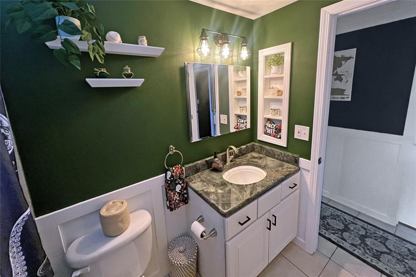 Remodeled Bathroom with Custom Shelving