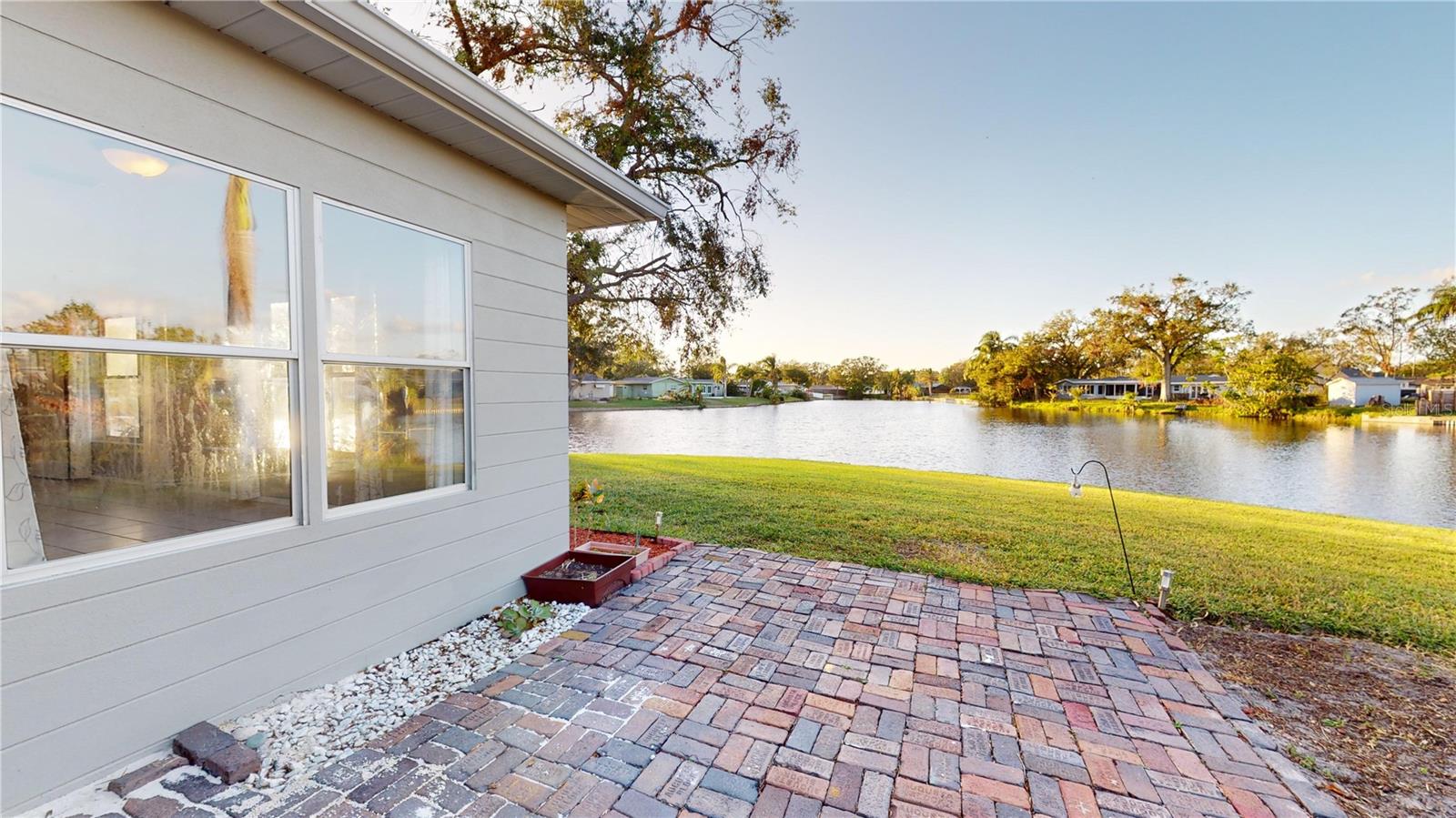 Beautiful Brick Paver Patio overlooking the Lake!