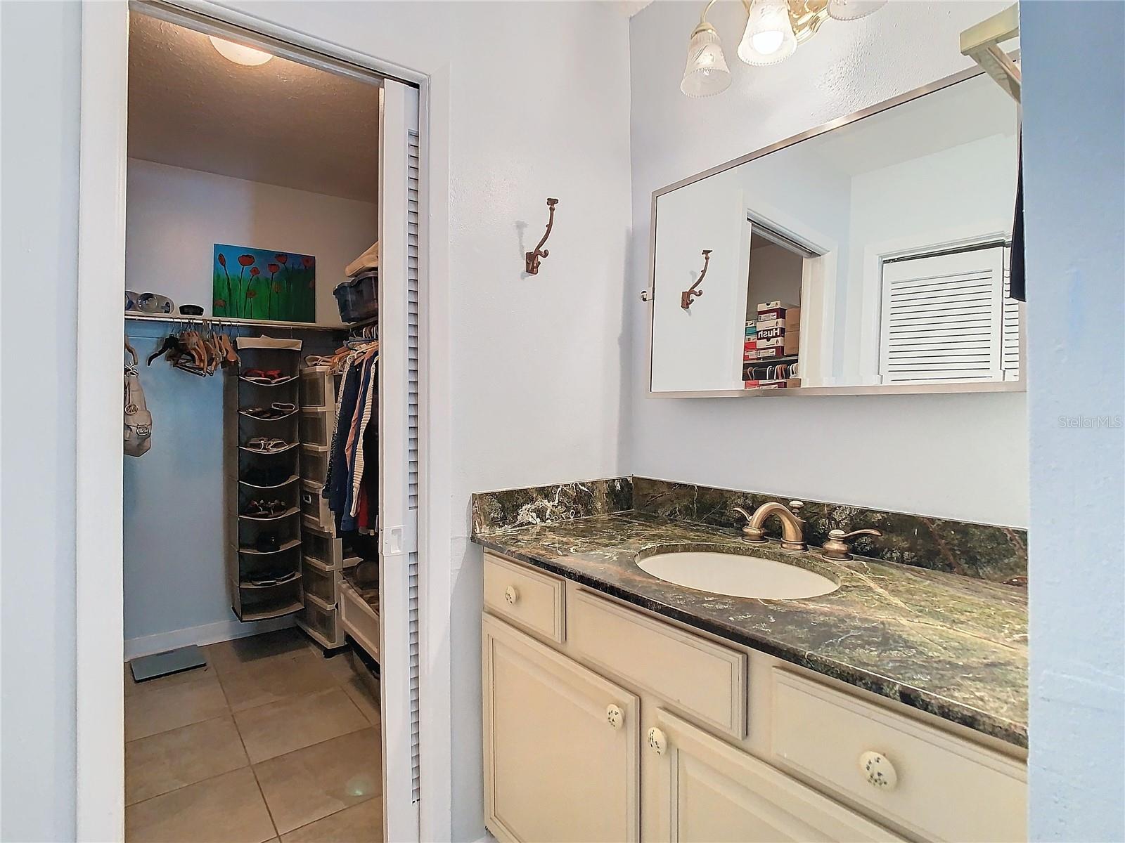 Split master vanity at walk-in closet