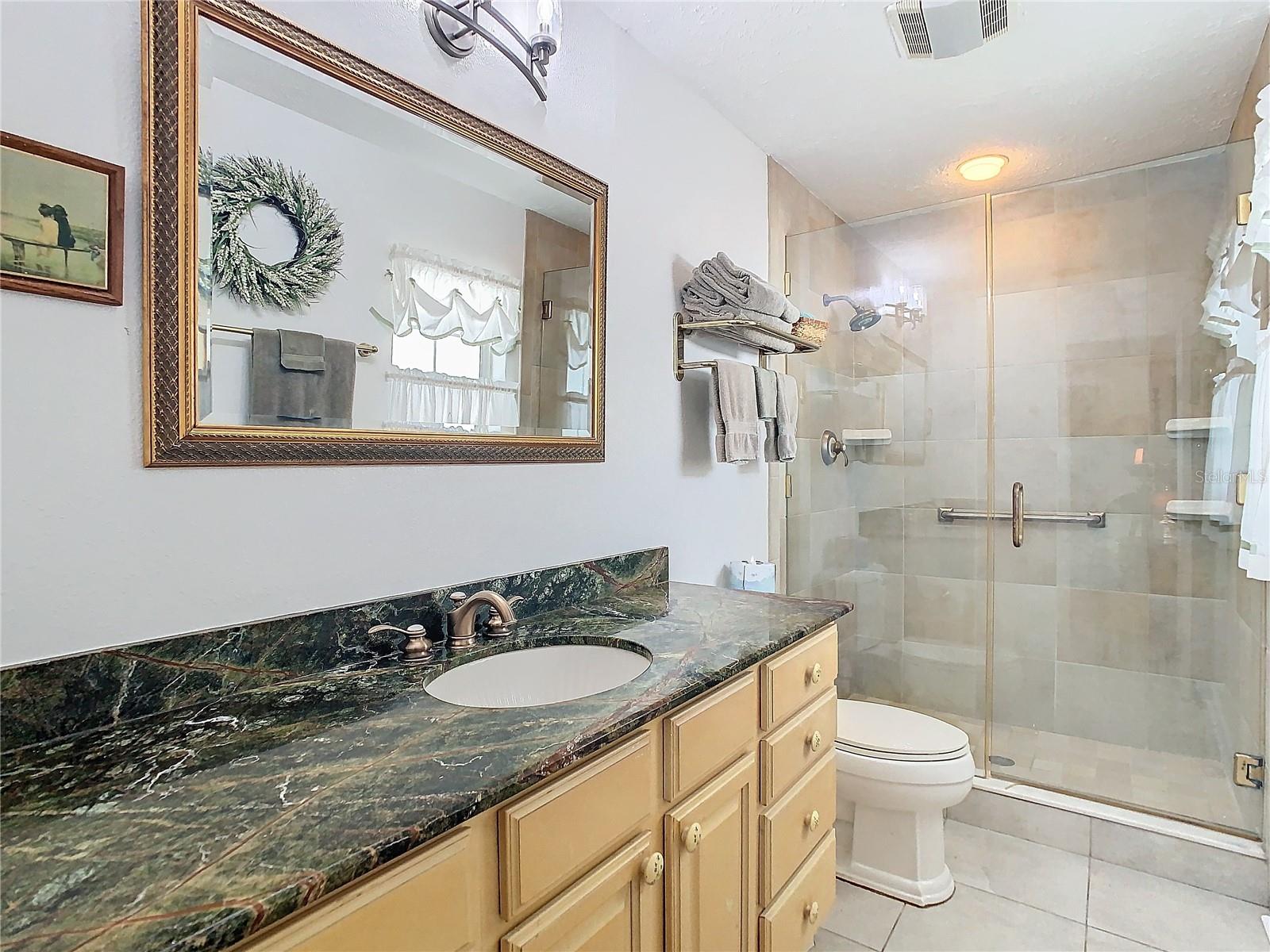 Master bathroom with split vanity