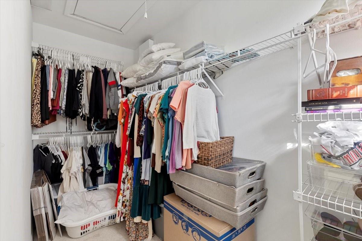 Primary bedroom walk-in closet & attic