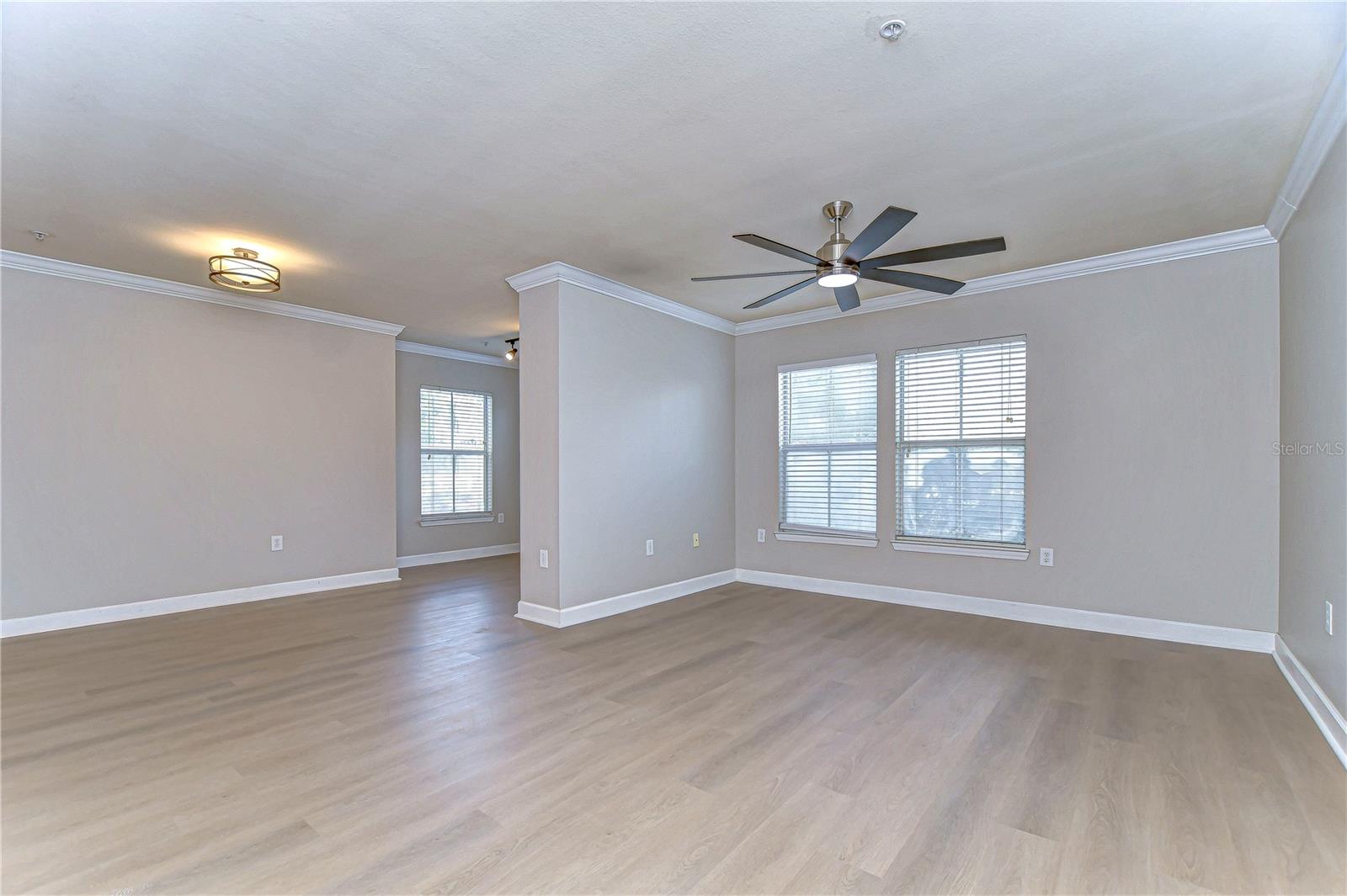 Living Room with Brand New Remote Fan, Dinette Area, and Nook