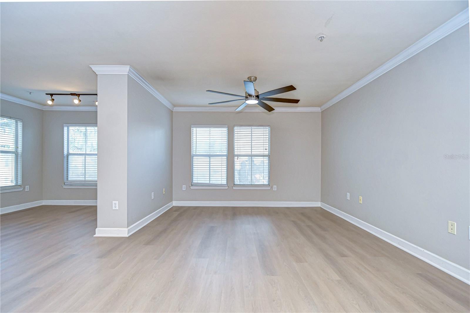 Living Room and Nook Area with BRAND NEW Luxury Vinyl Plank