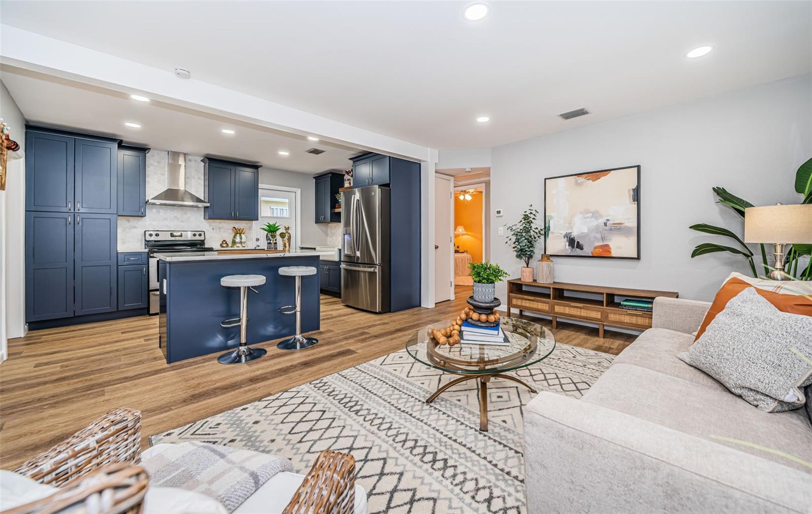 Meet your gorgeous new open kitchen / living dream area.  Light, bright, and clean.