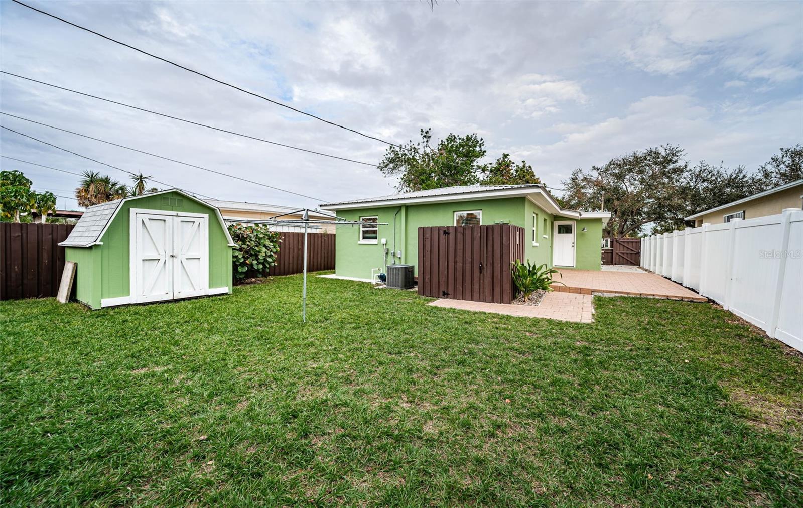 Completely fenced for absolute privacy.  Could there be a pool in your future?