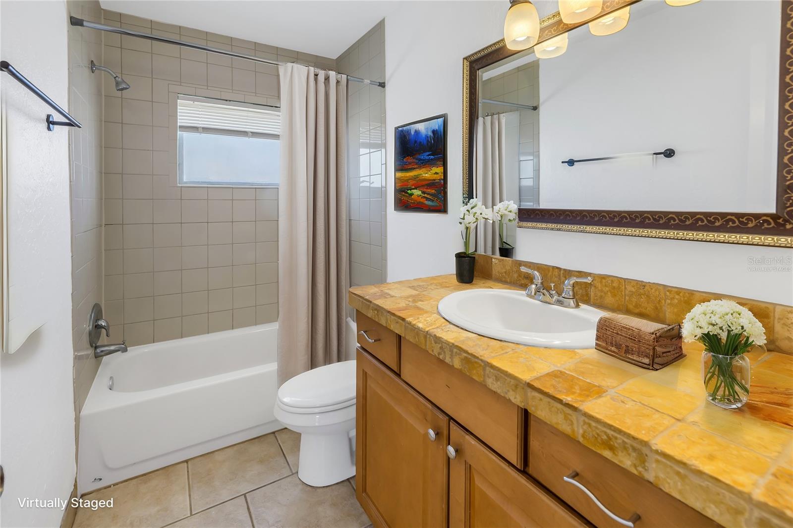 Virtually staged guest bathroom.