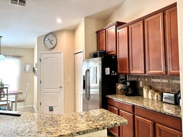 Kitchen to coffee bar and pantry view