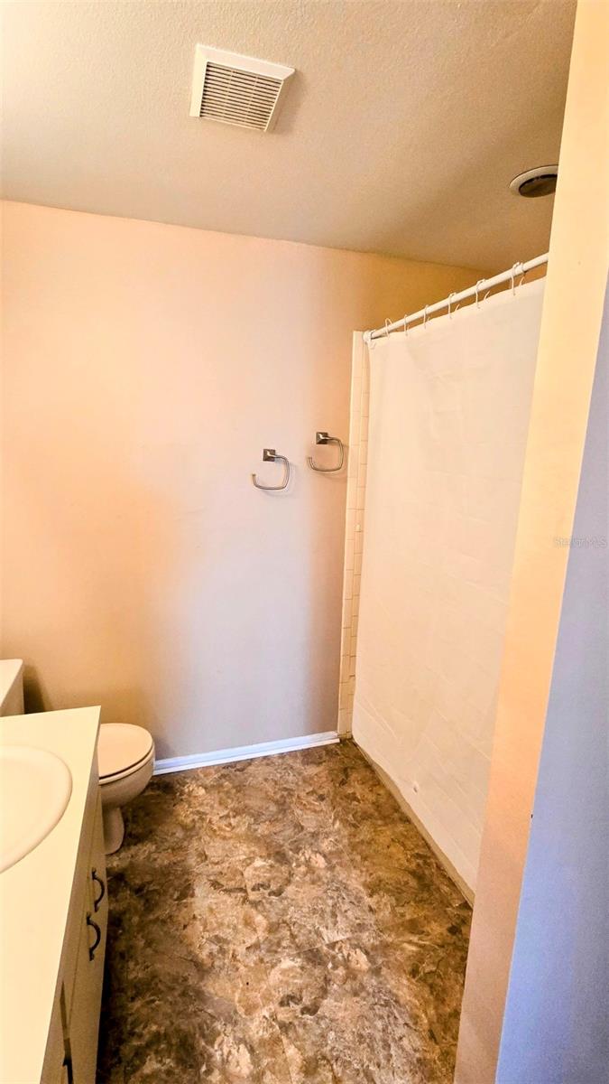 Primary Bathroom - tub with shower