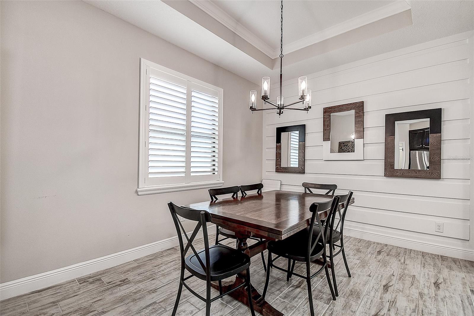 Dining room with wall feature