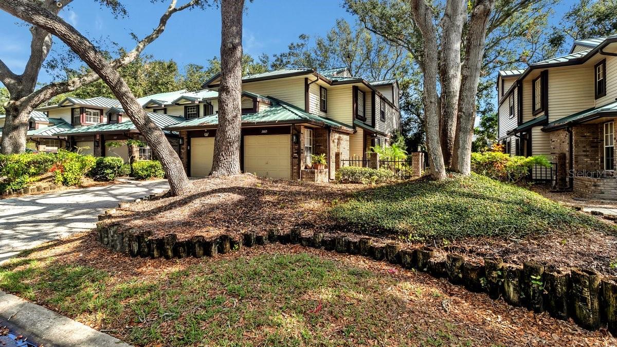 Long shared driveway and 1 car garage.