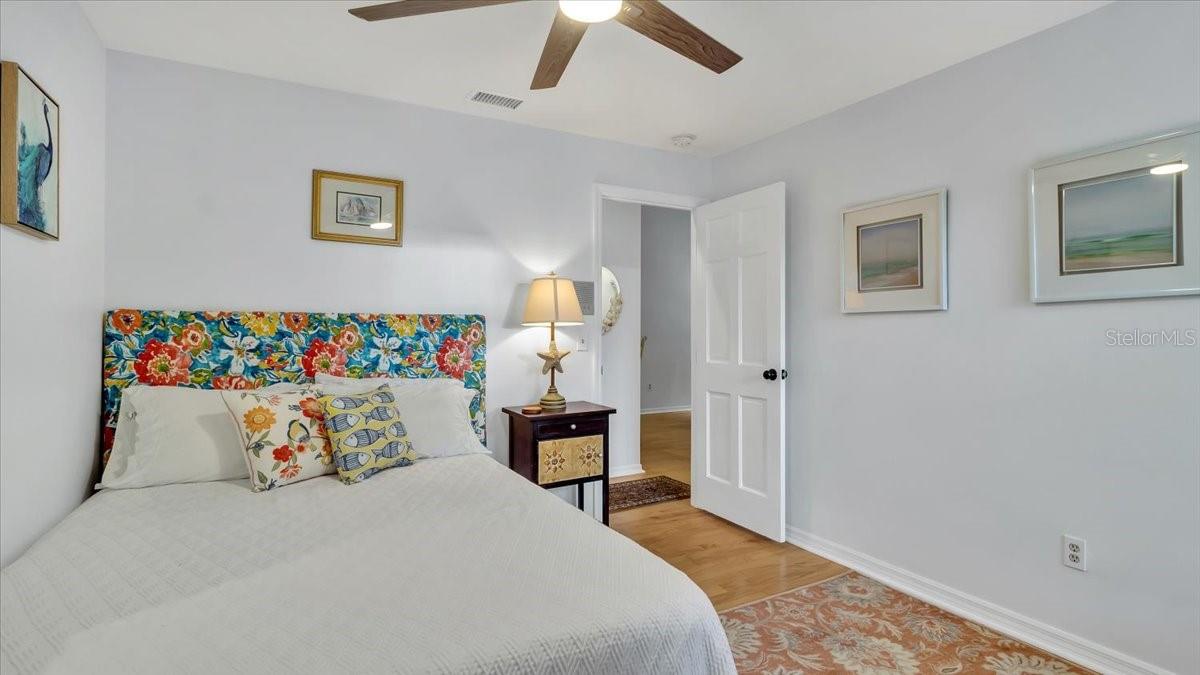 Second bedroom freshly painted with new door and hardware.