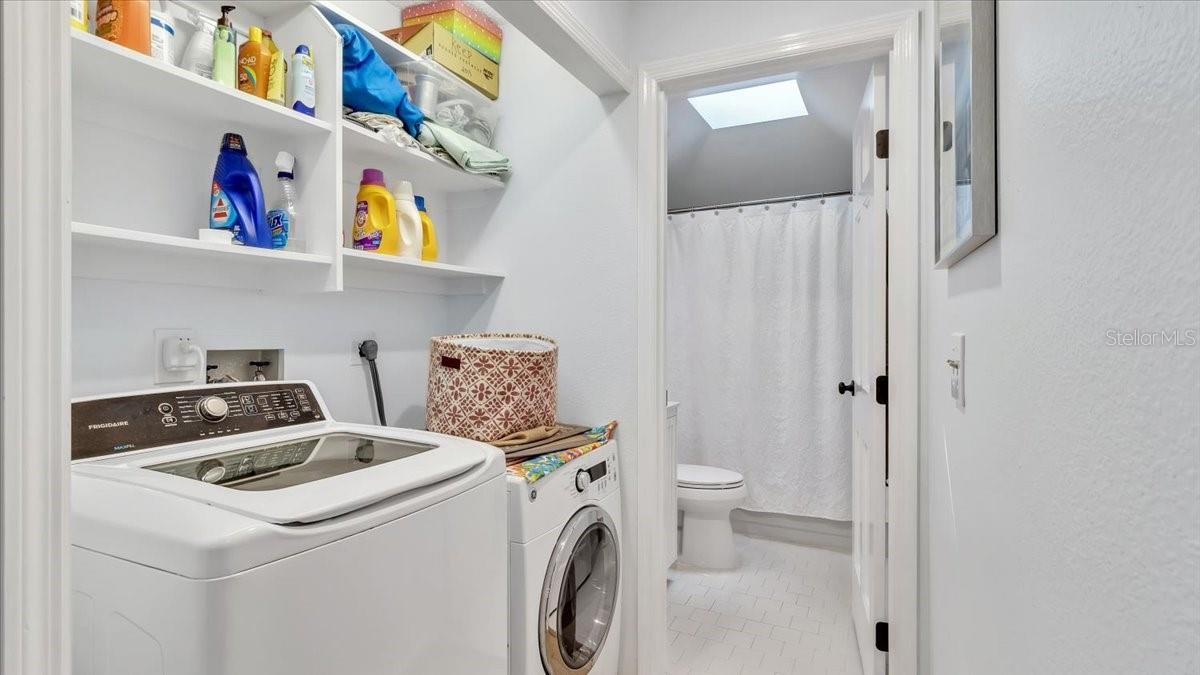 Laundry room and entrance to hall bathroom.