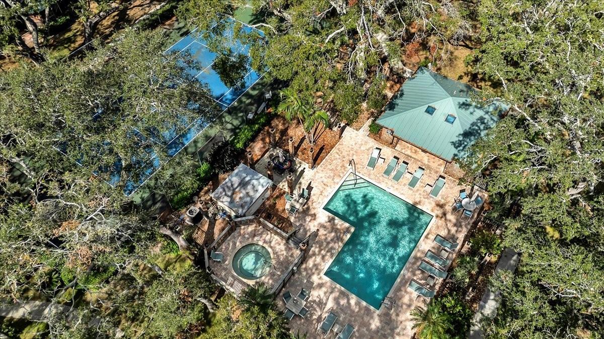 Pool and spa area with bathrooms.