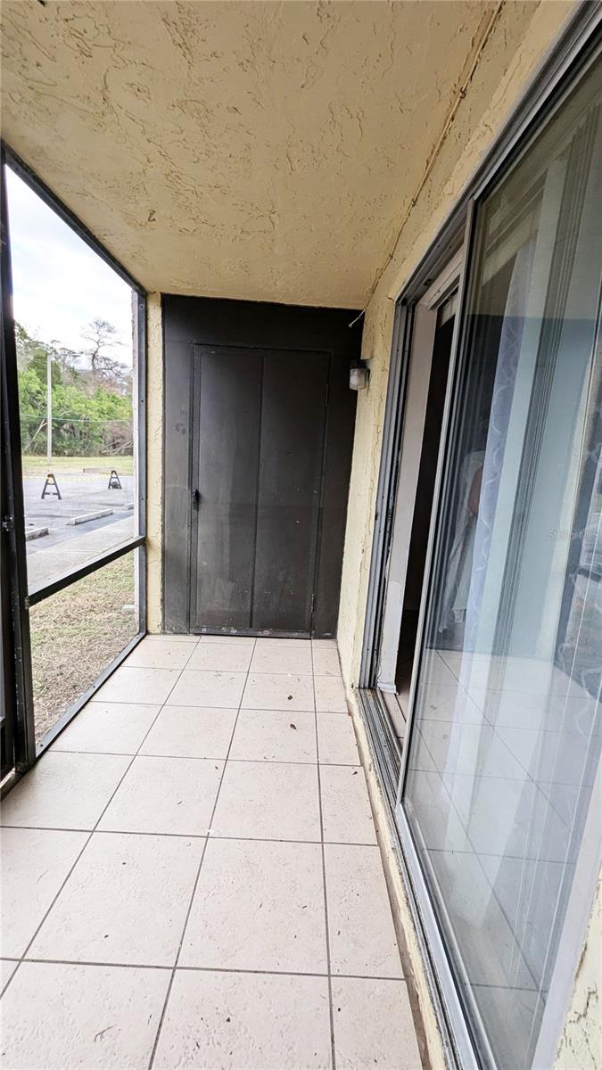 SCREENED PATIO WITH STORAGE