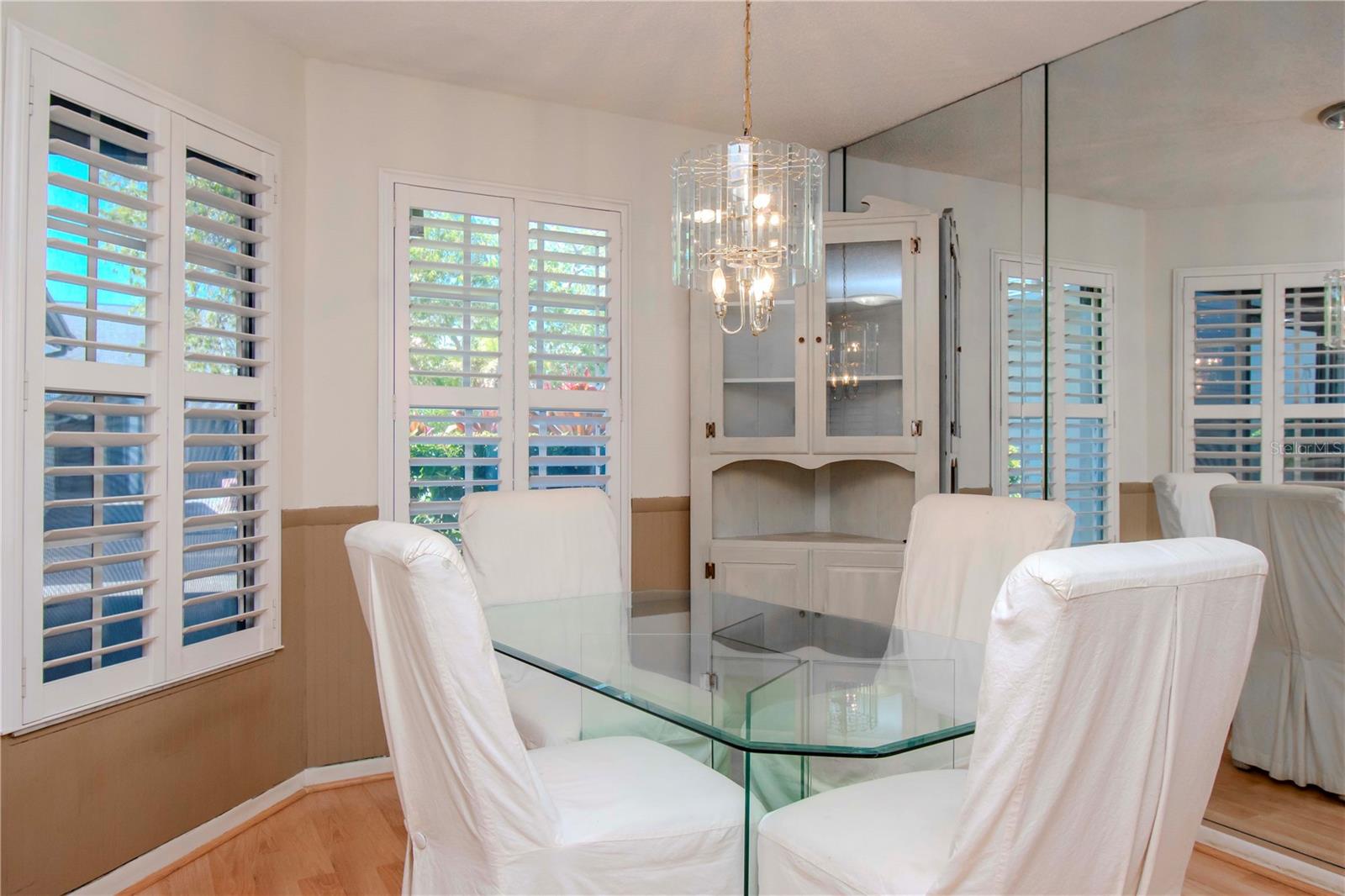 Lighted dining area.  Plantation shutters for added privacy.