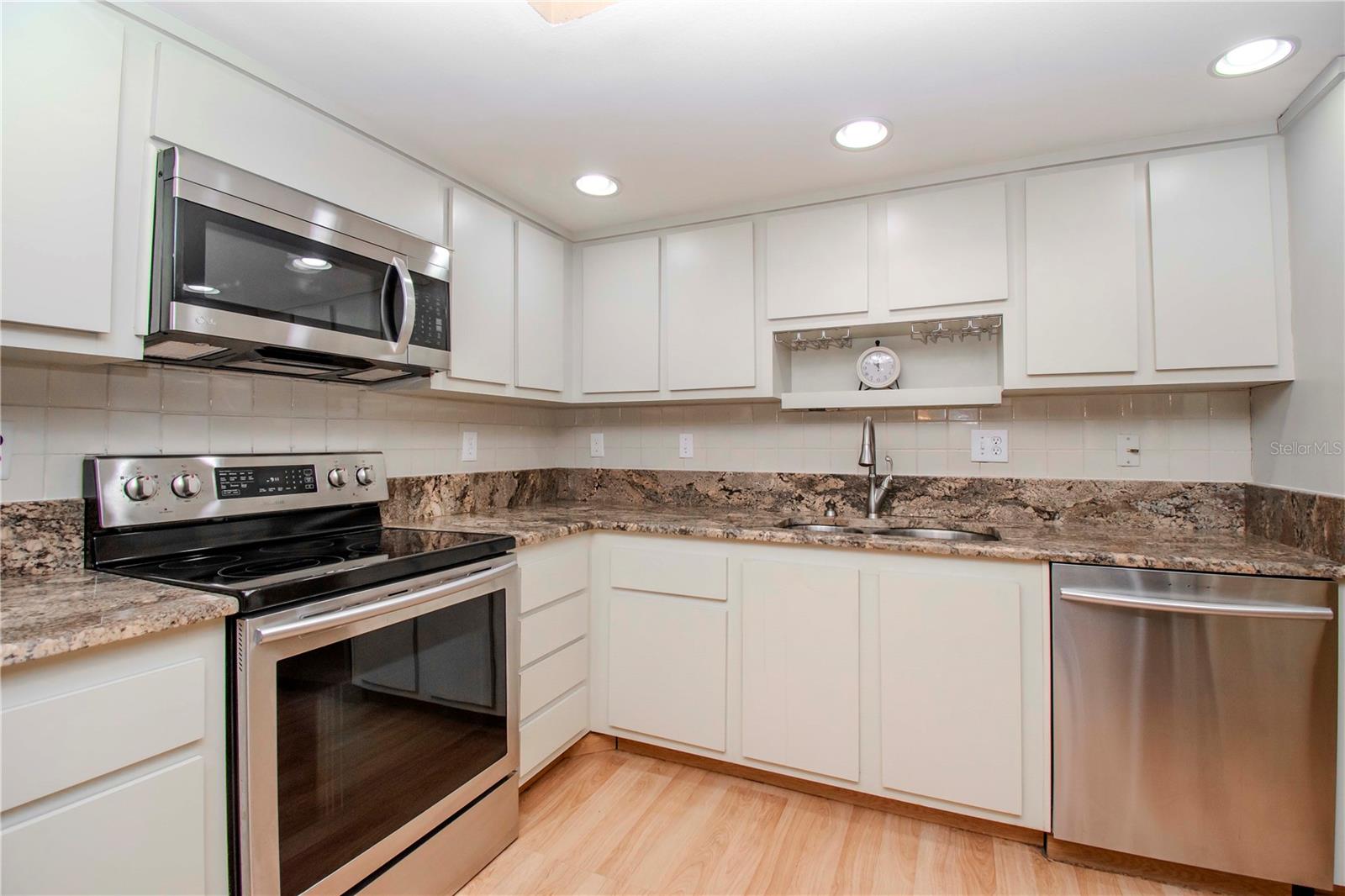 Lots of cabinet space in the kitchen.  Stainless appliances and granite countertops.