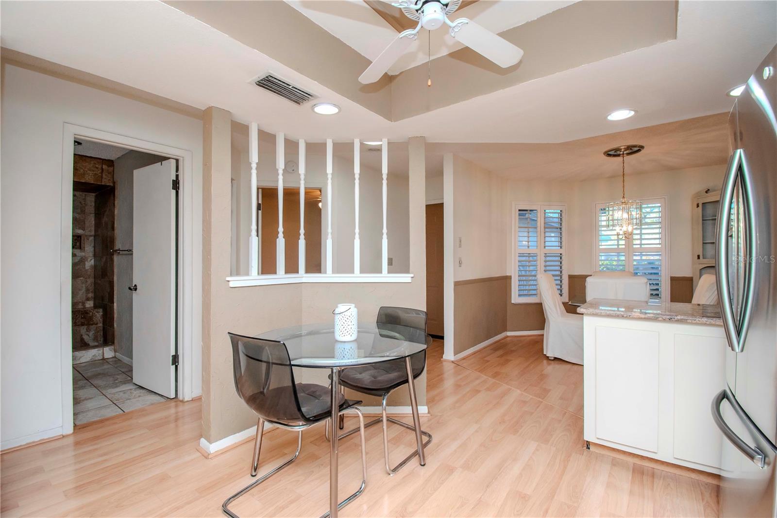 View into the 2nd bed and bath and dining area.