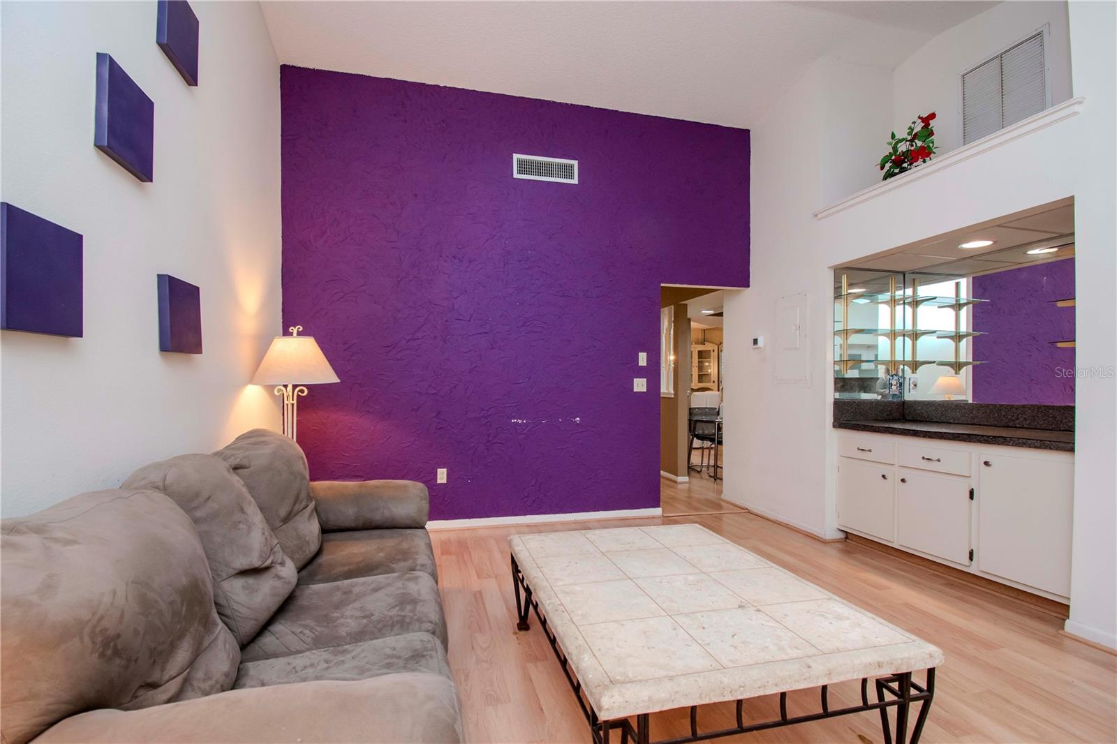 Living room with dry bar area.