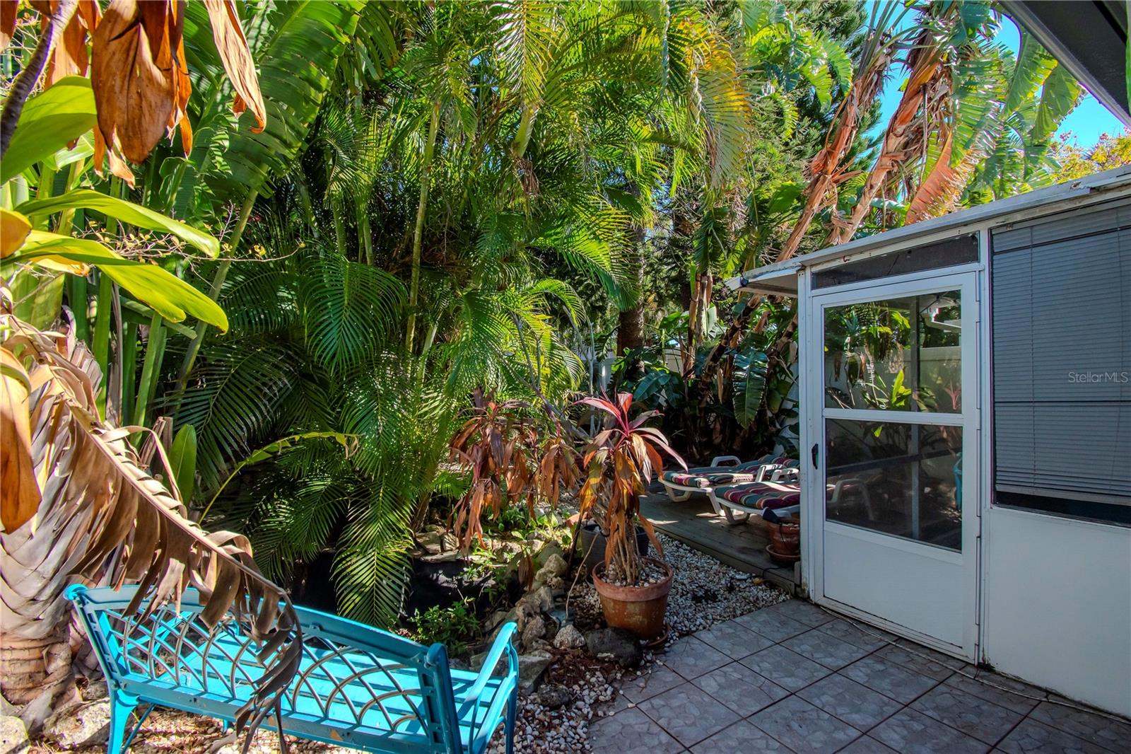 Lovely fenced back yard with a Koi pond ready for you to add water and fish.