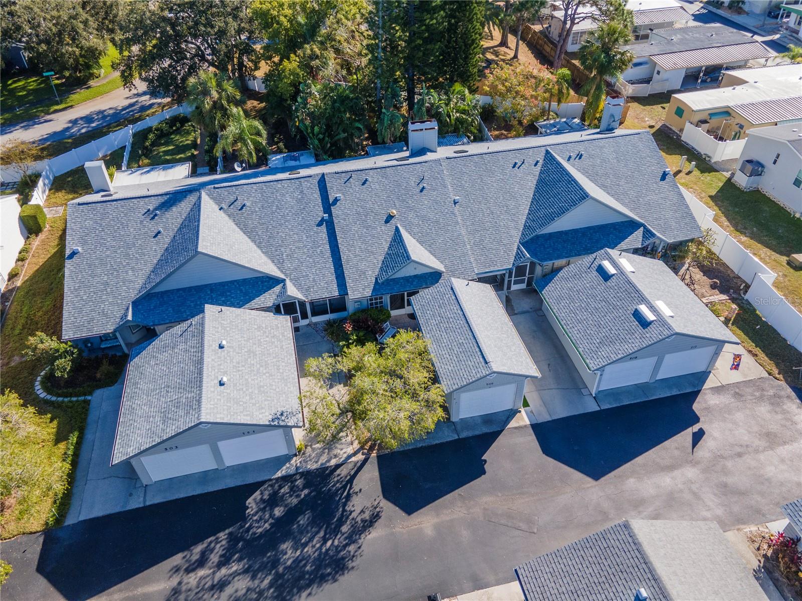 Aerial view of the villa and all units on the street