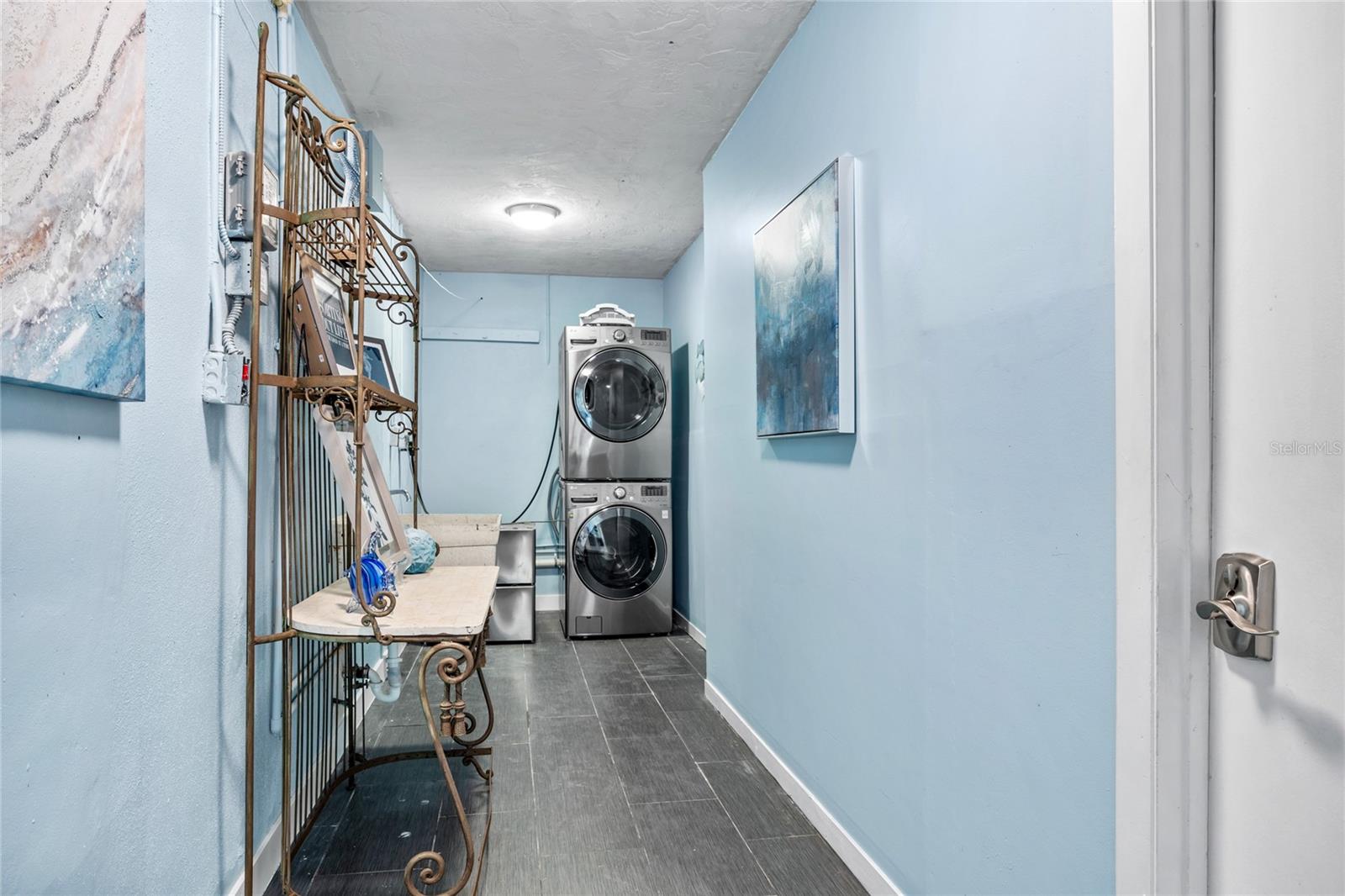 The spacious indoor laundry room is a true game changer, sure to make laundry day more comfortable and efficient.