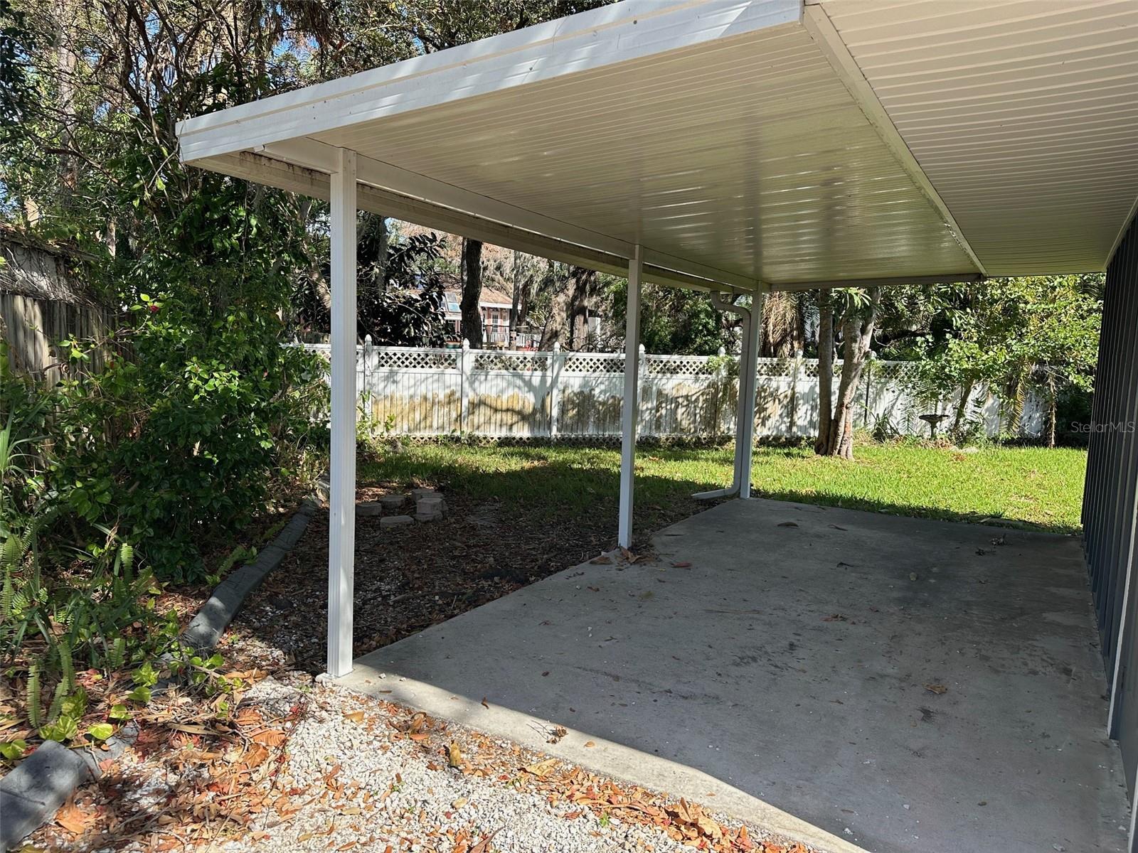 Carport adjacent to garage