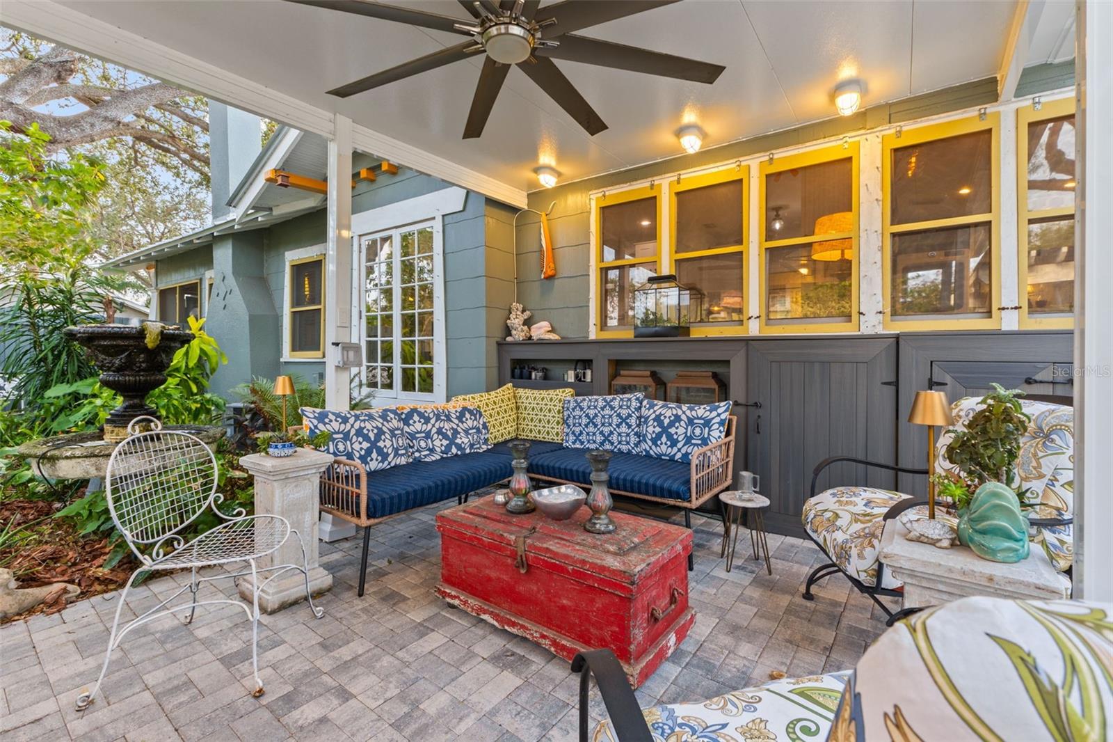 Additional Outdoor Covered Seating Area with Custom Cabinetry