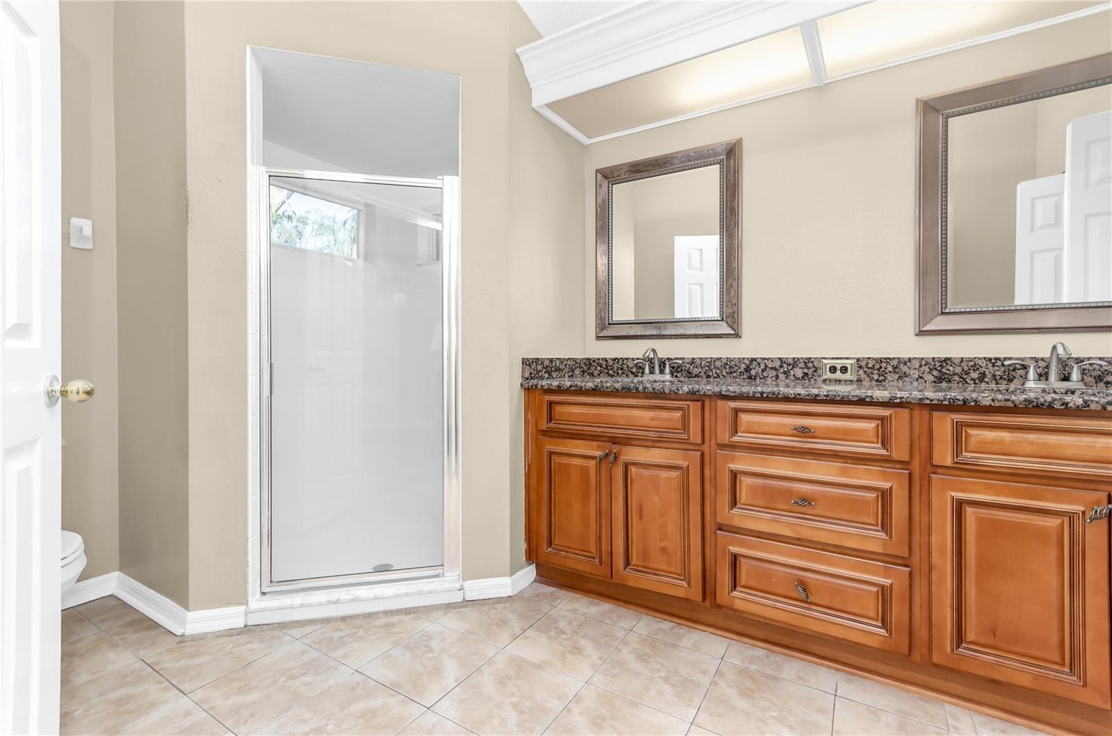 Double Sinks, Stand Up Shower with Glass Enclosure