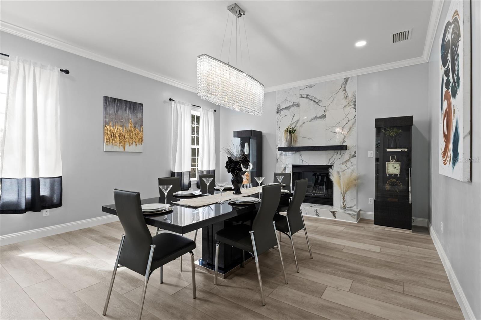 Formal Dining Room Crowned by an Exquisite Chandelier