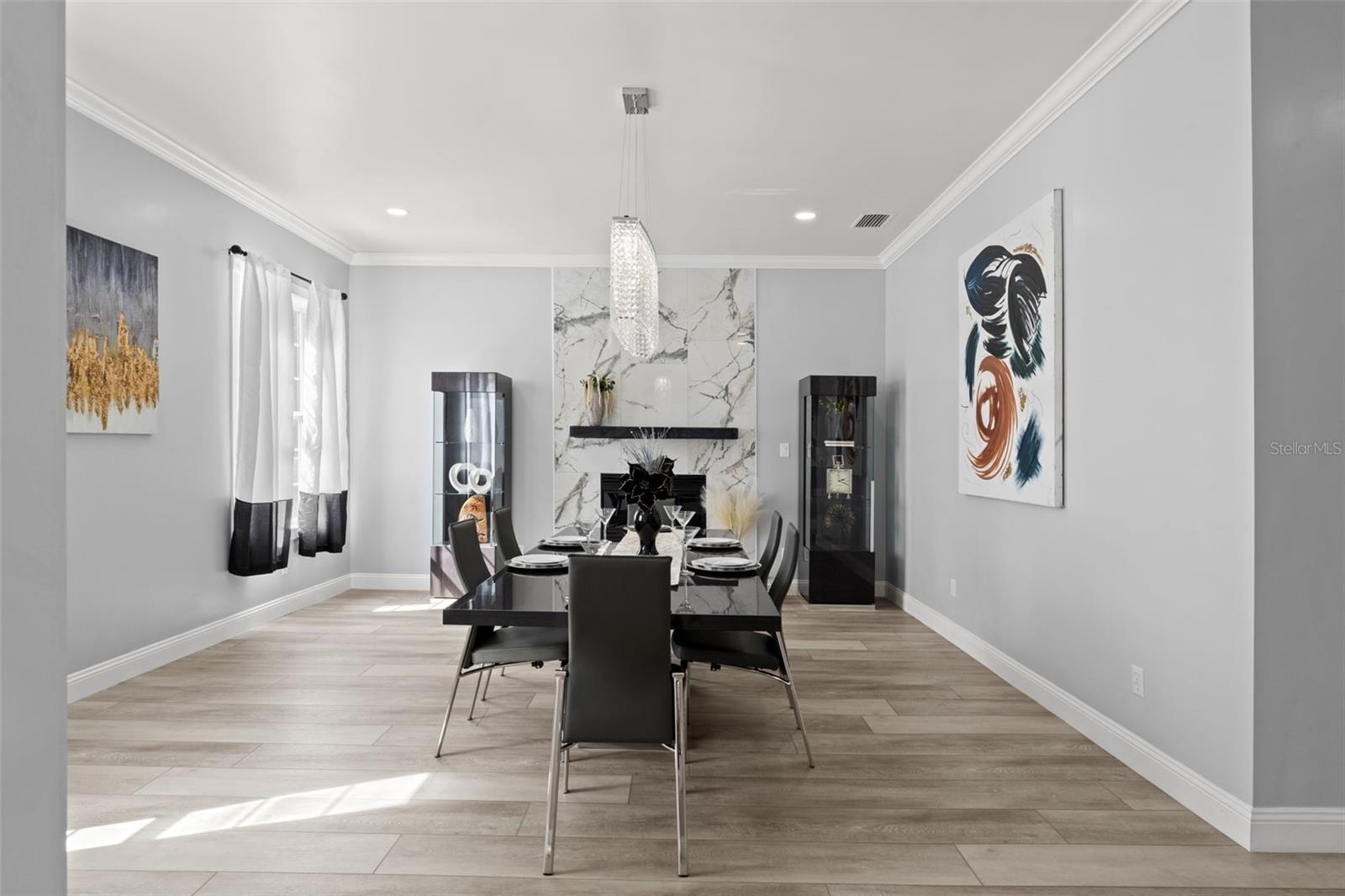 Formal Dining Room Crowned by an Exquisite Chandelier