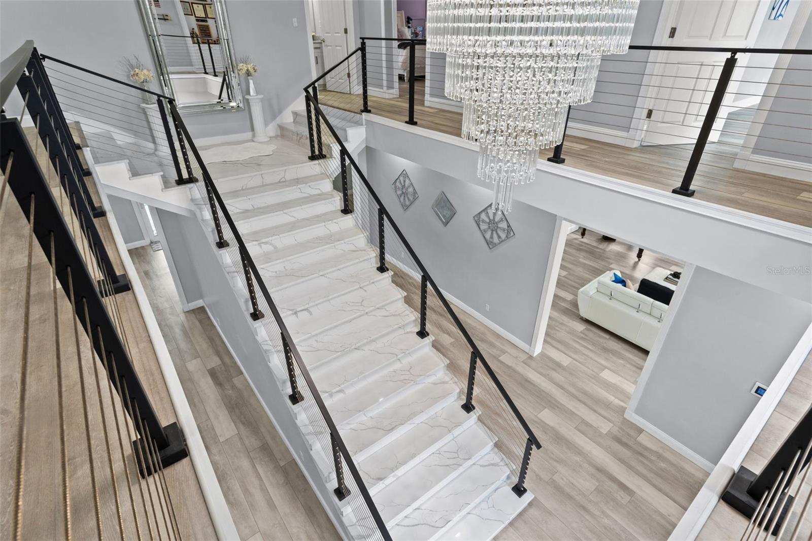 Grand Entryway & Majestic 2 Story Foyer with custom quartz staircase with modern cable railing