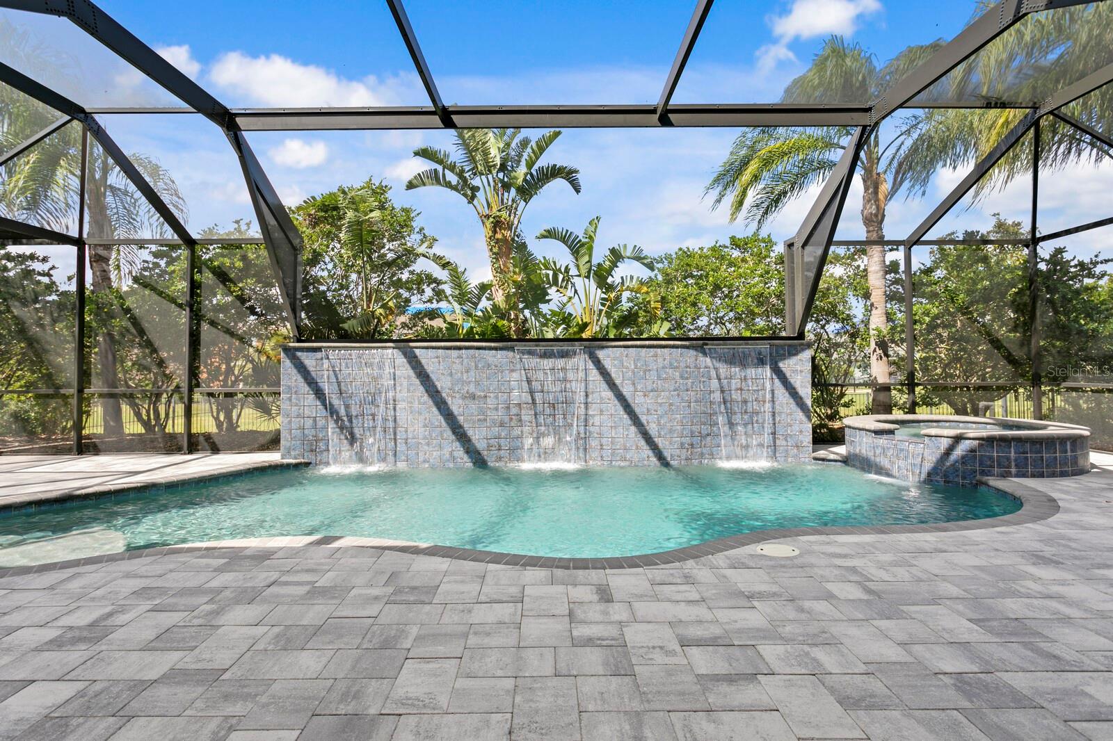 Enjoy Florida living and swimming year-round in your custom saltwater pool & spa while enjoying exceptional resort-like privacy on the lanai