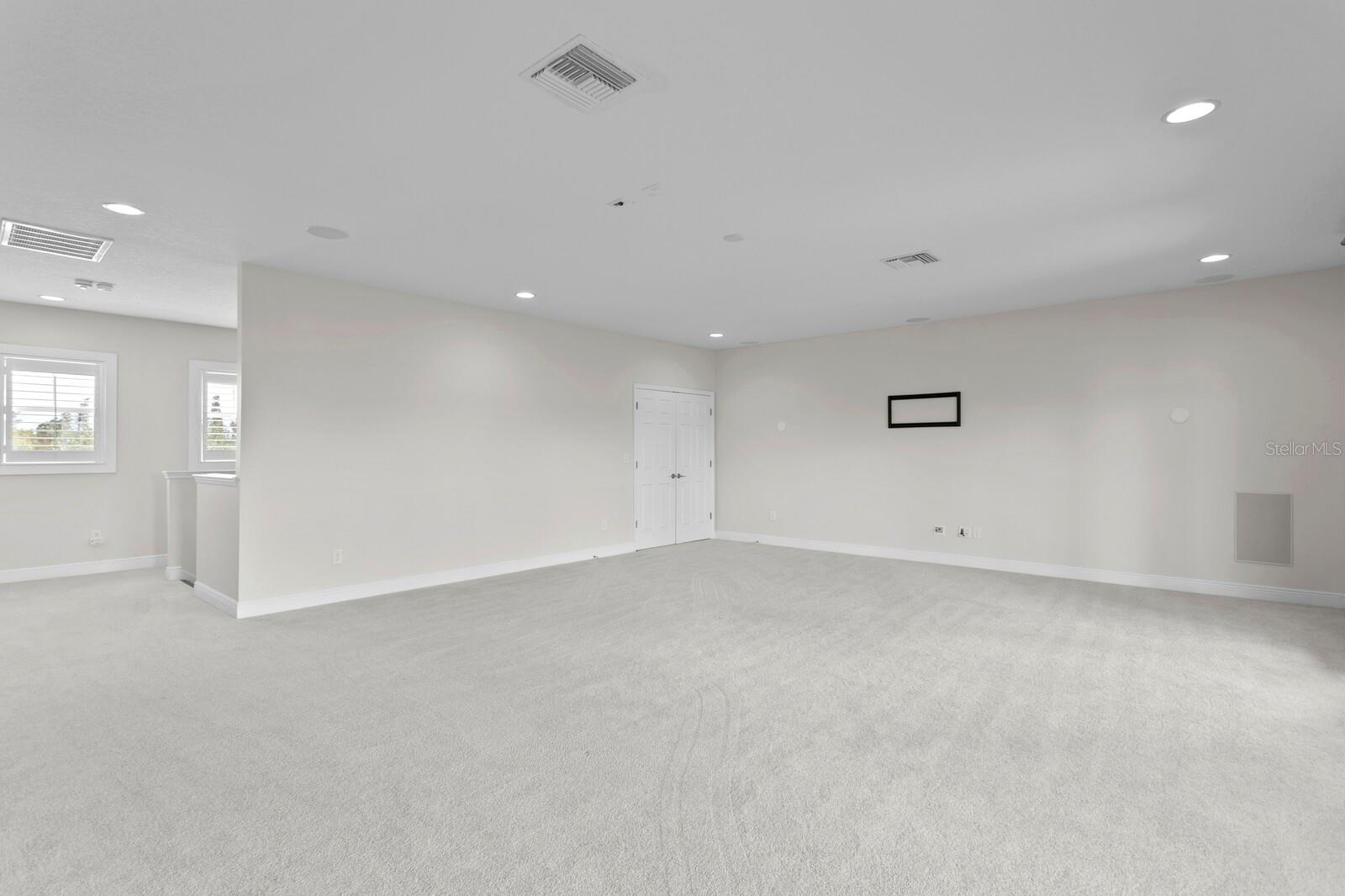 The massive 2nd floor bonus room has a complete surround sound system installed and is pre-wired for a fantastic media room space