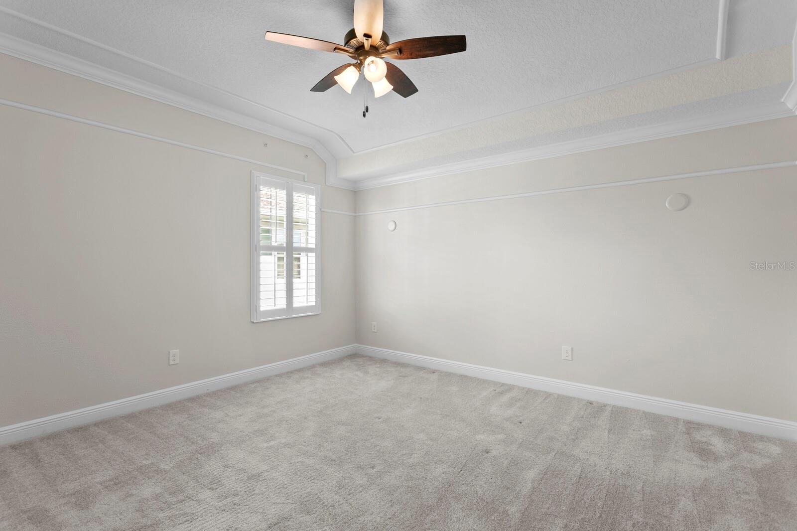 This bedroom is located on the 2nd floor and features decorative millwork and makes for a very private guest suite