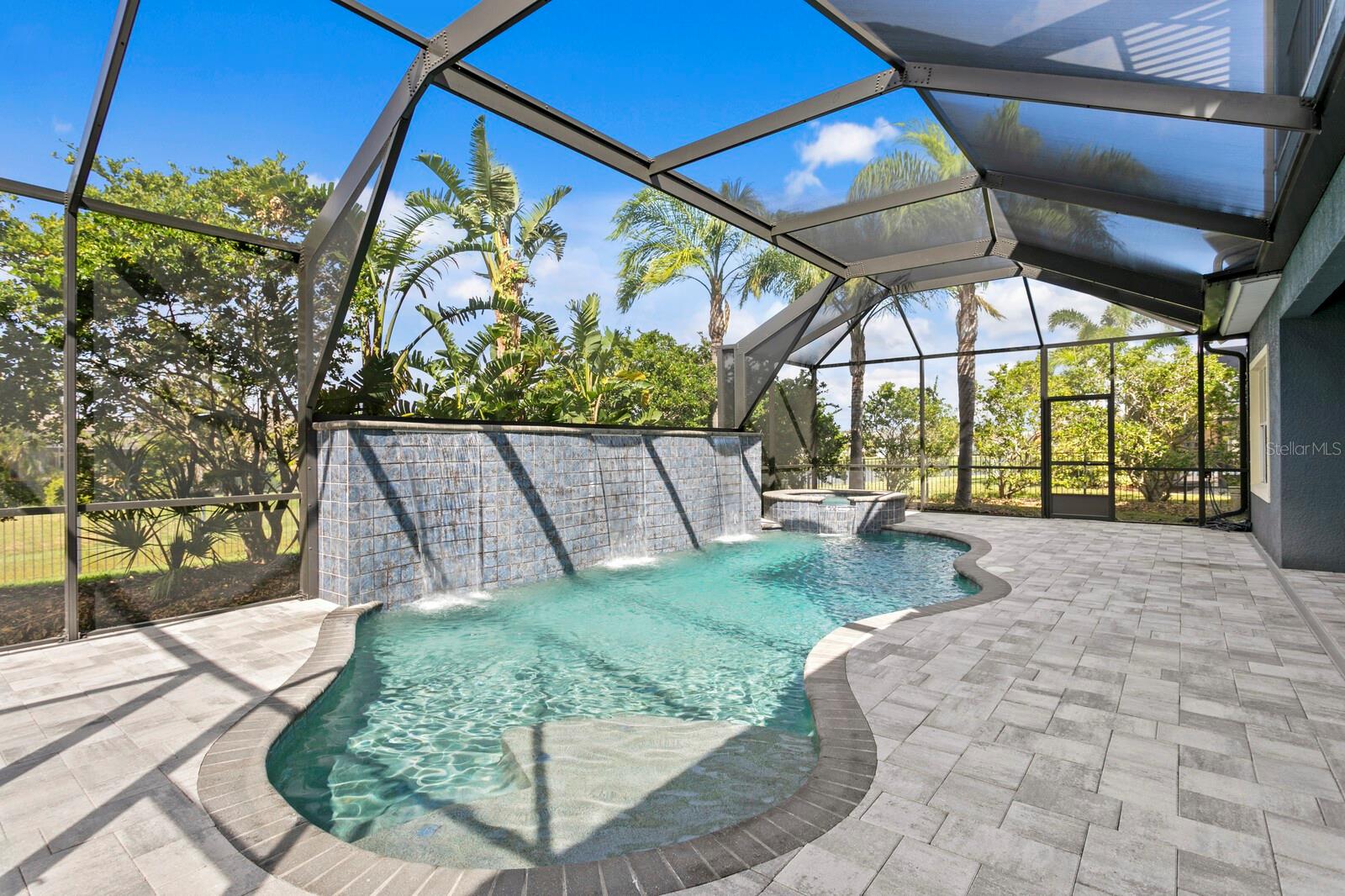 The nearly 1,200sqft screen enclosed lanai and pool area makes for a perfect outdoor entertaining space