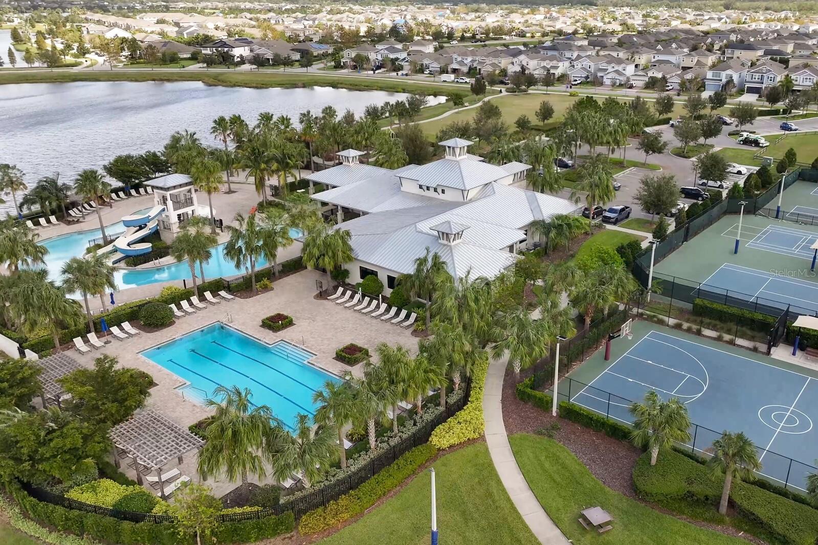 The new Waterset Club has an amazing clubhouse experience that feels more like a vacation.  Enjoy a resort-style swimming pool with two slides, a lap pool, fitness room, game room and gathering space.