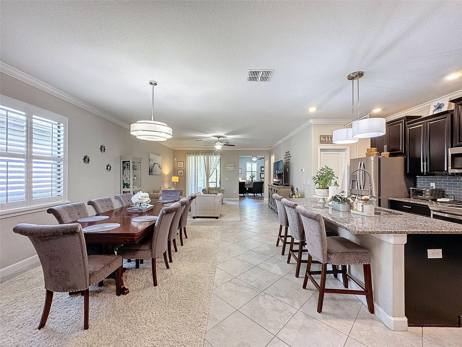 Dining Room, Kitchen, Living Room looking into Den and Back Porch