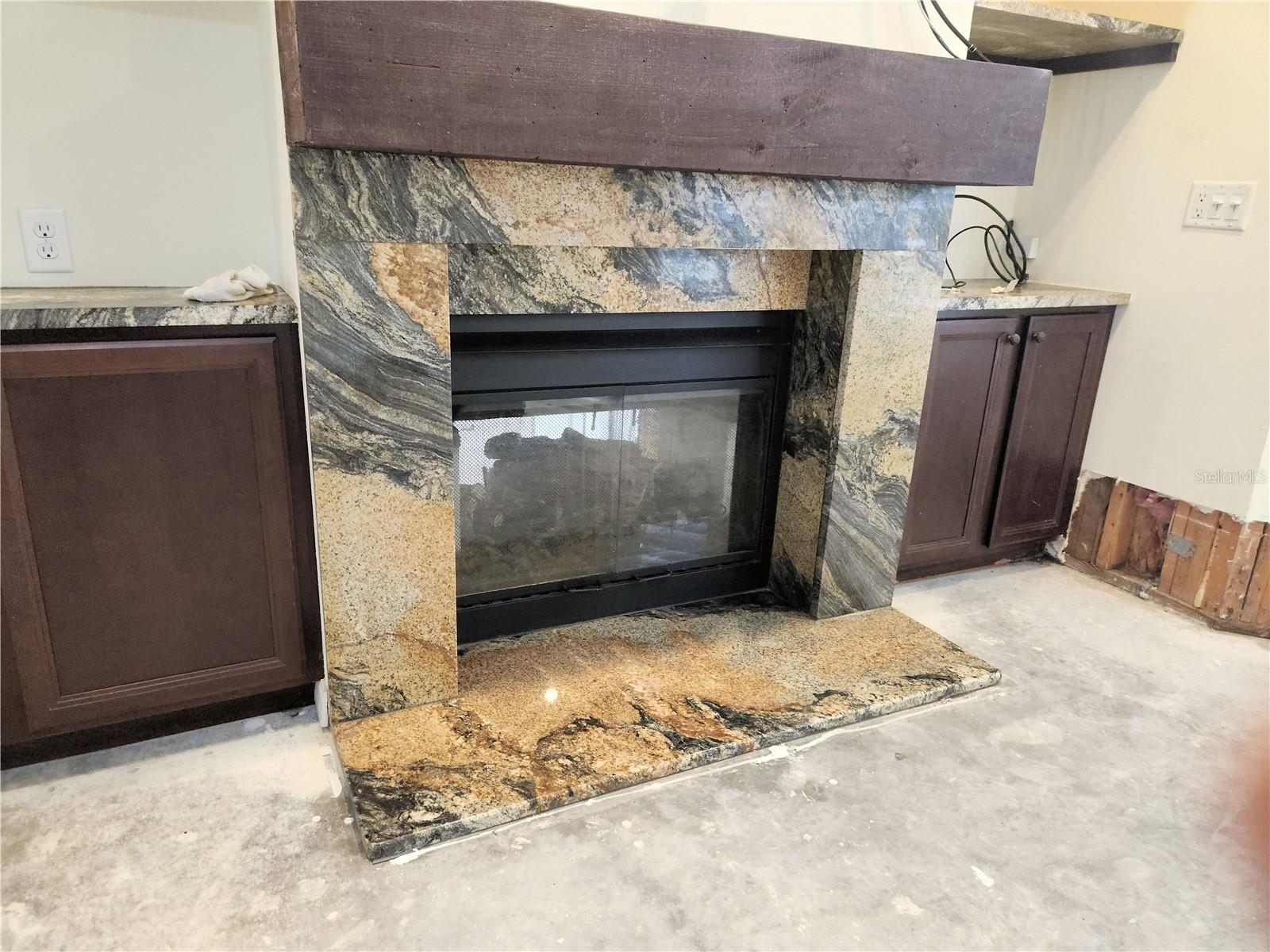 Living room side of pass-through fireplace