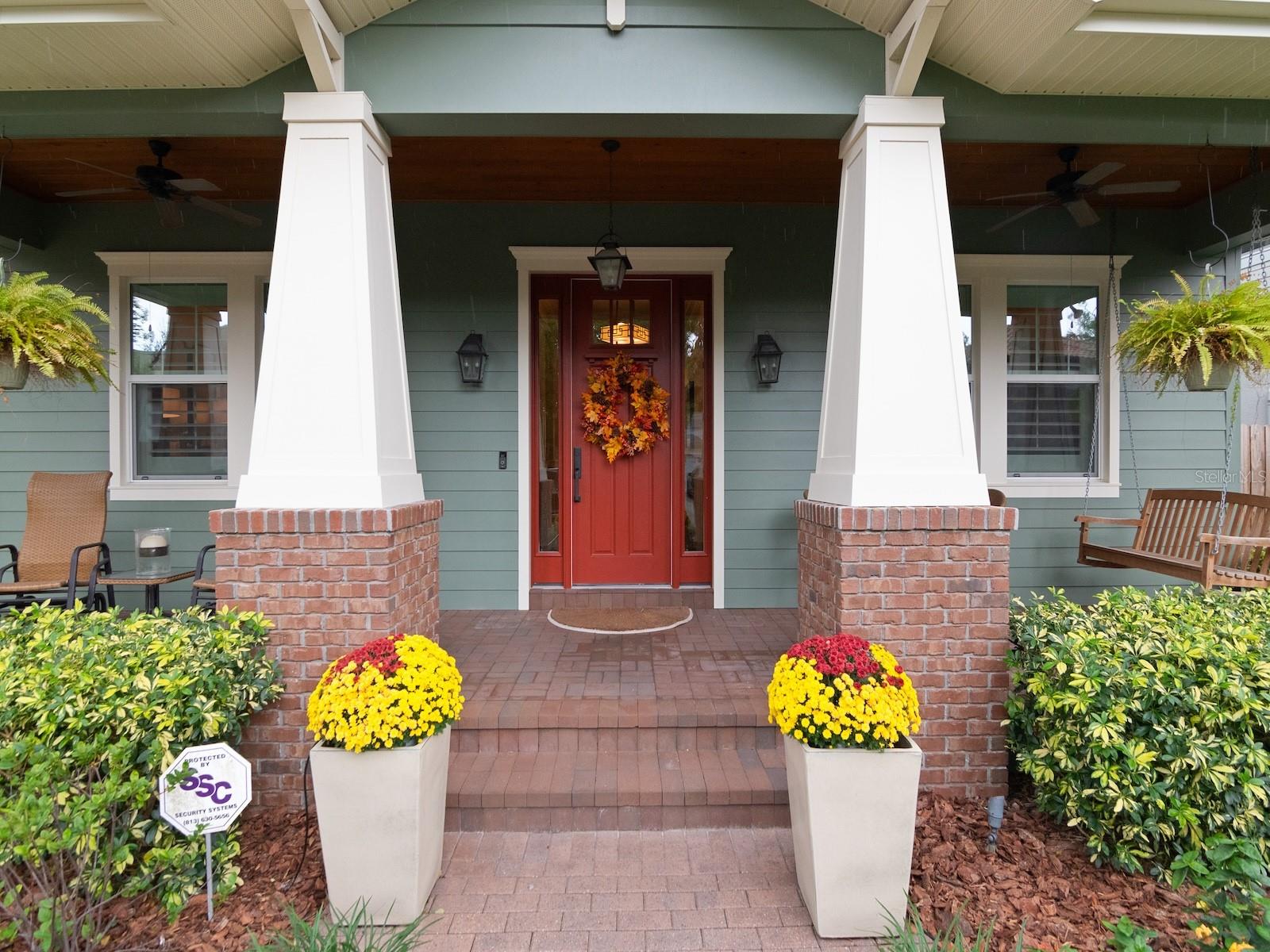 Charming entrance is reminiscent of Hyde Park --- but in a newer, low maintenance home.