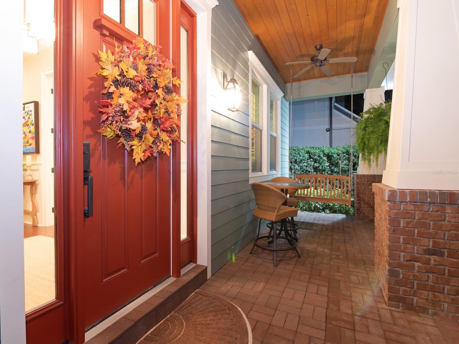 hall flanked by walk in closets connects primary bedroom and bath.