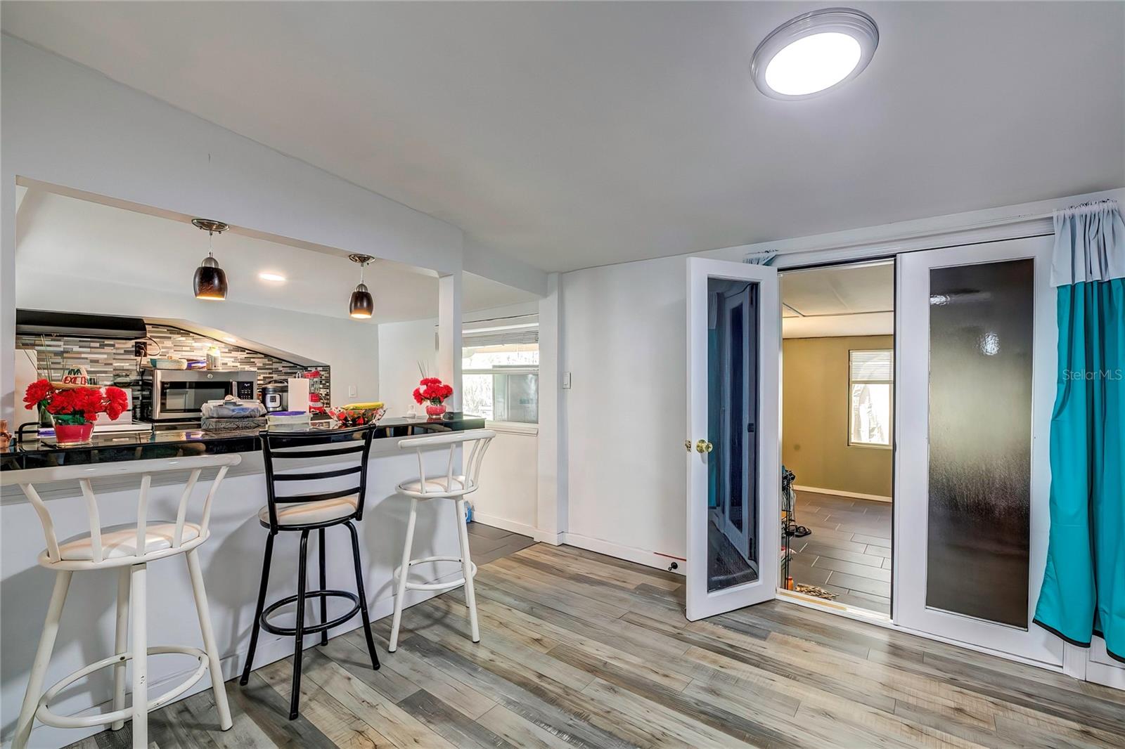 Double doors lead to master bedroom