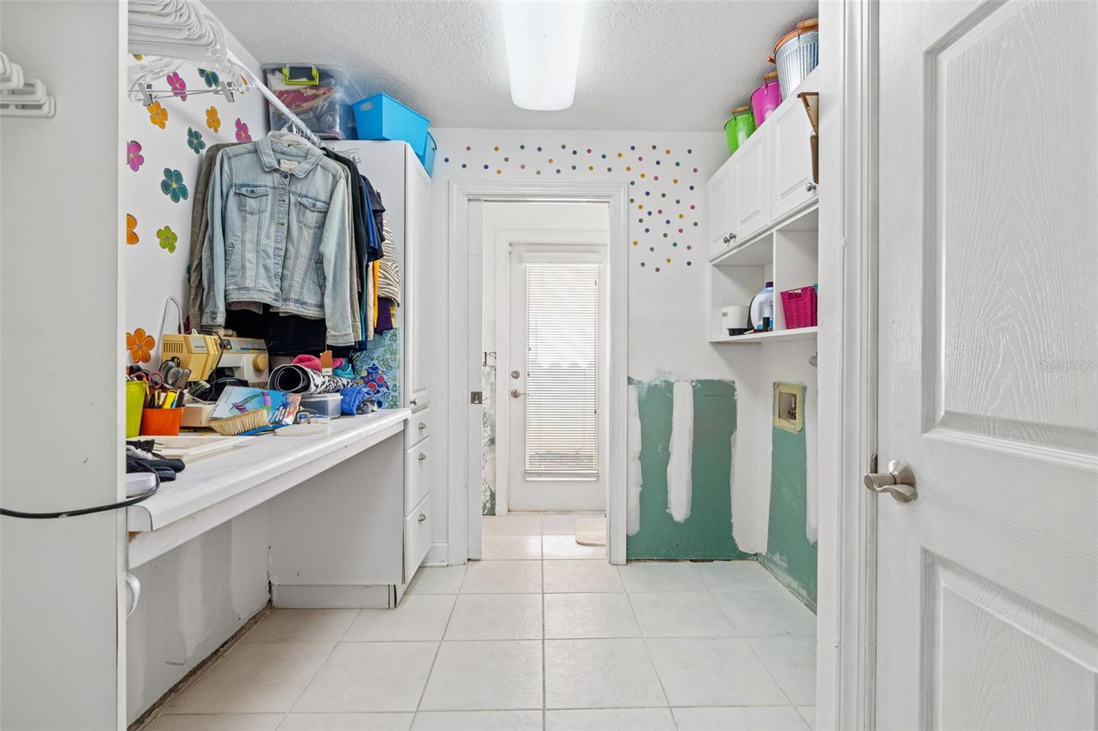 Walk-through closet for 3rd bedroom