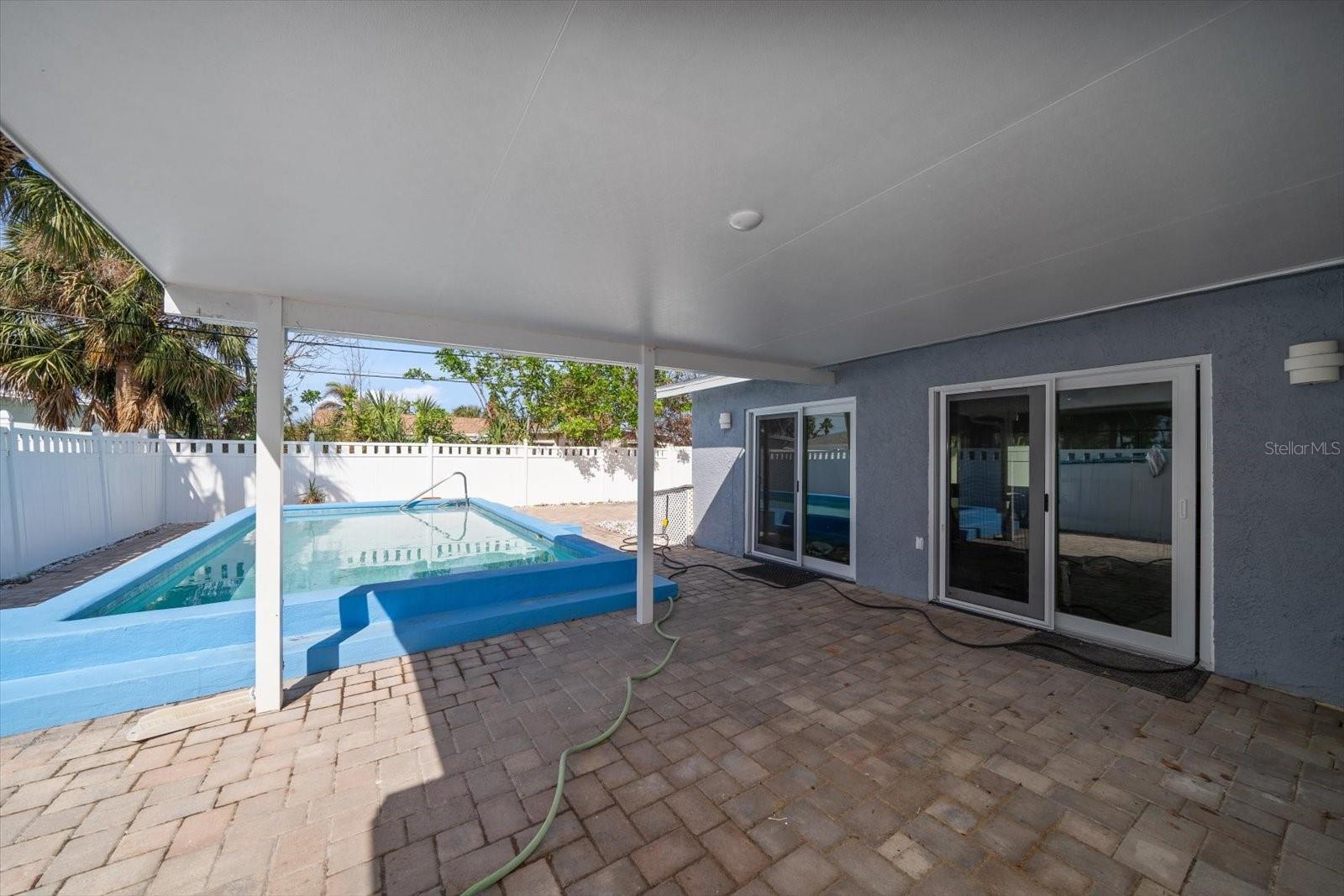 Covered back patio with paver deck