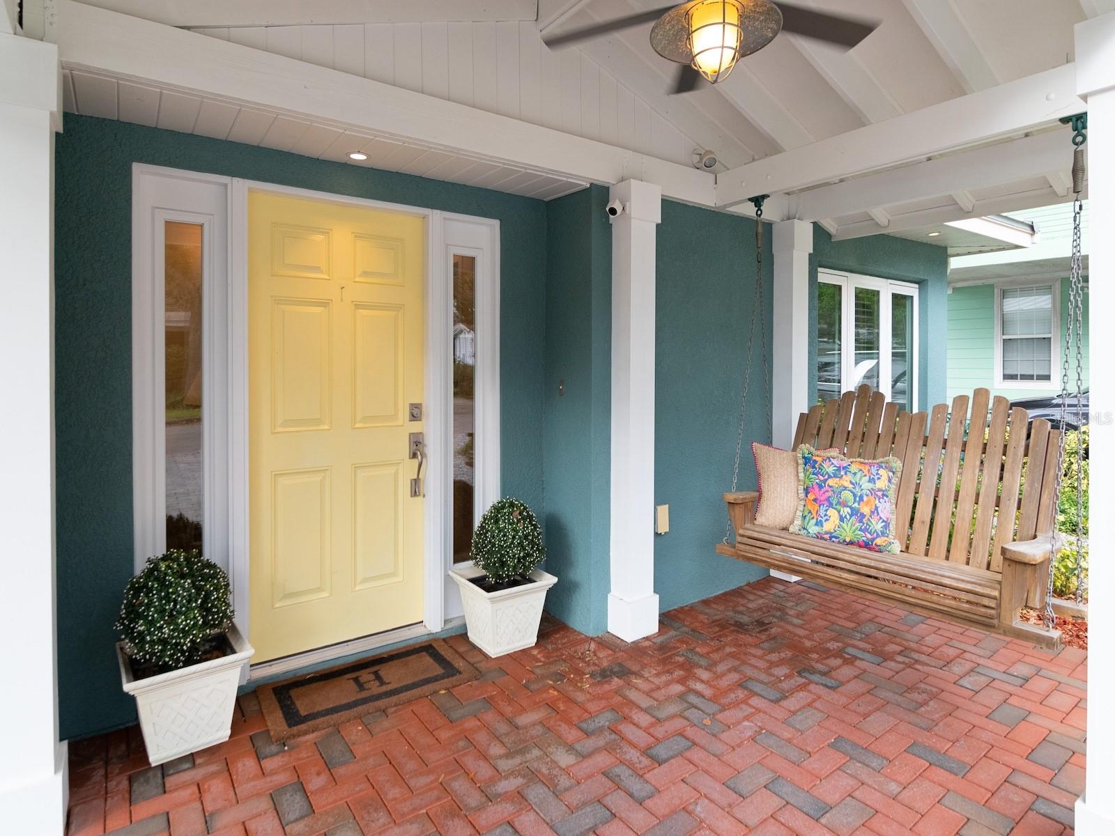 Enjoy your morning coffee on the porch swing.