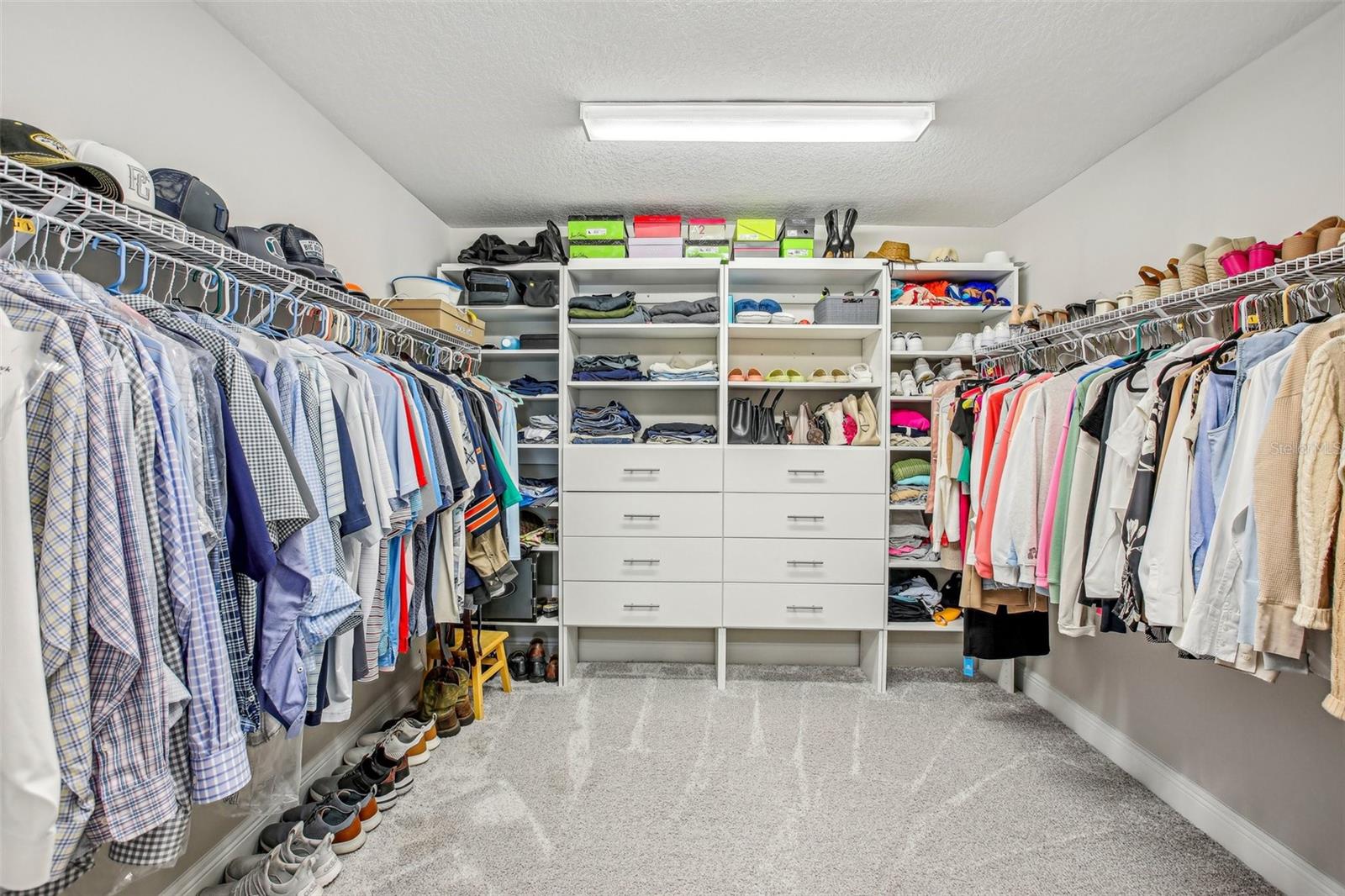 PRIMARY SUITE SPOILS YOU WITH A LARGE WALK-IN CLOSET