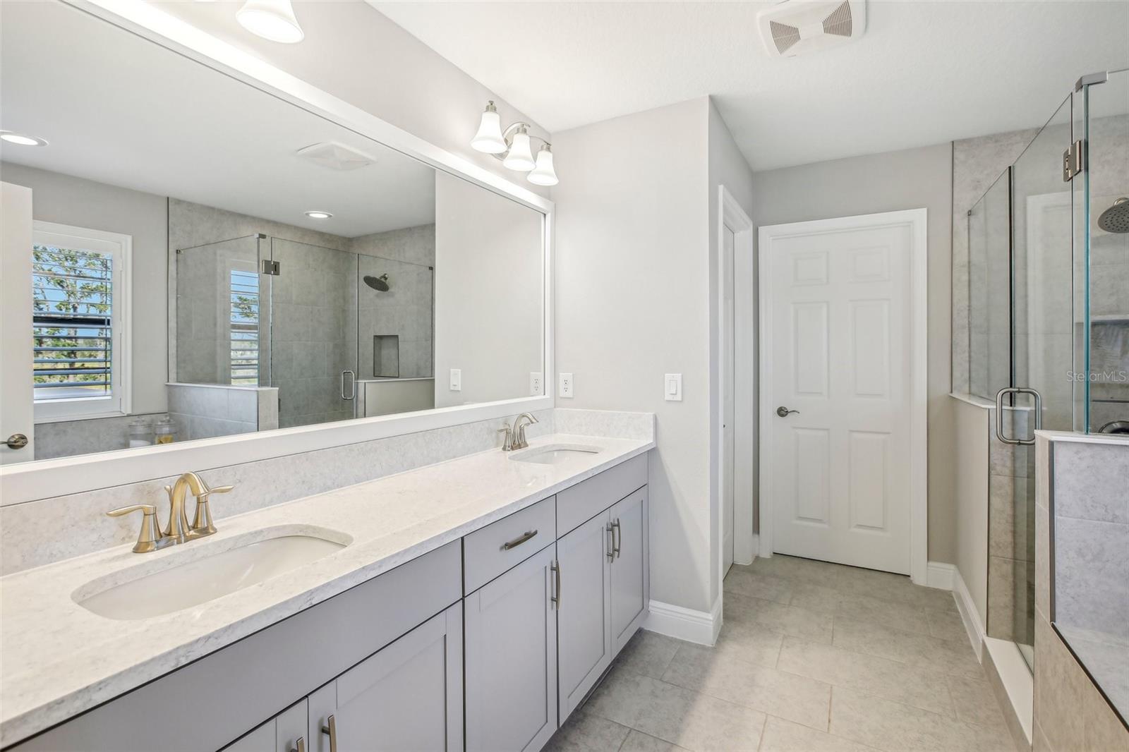 PRIMARY BATHROOM WITH DOUBLE SINK VANITY